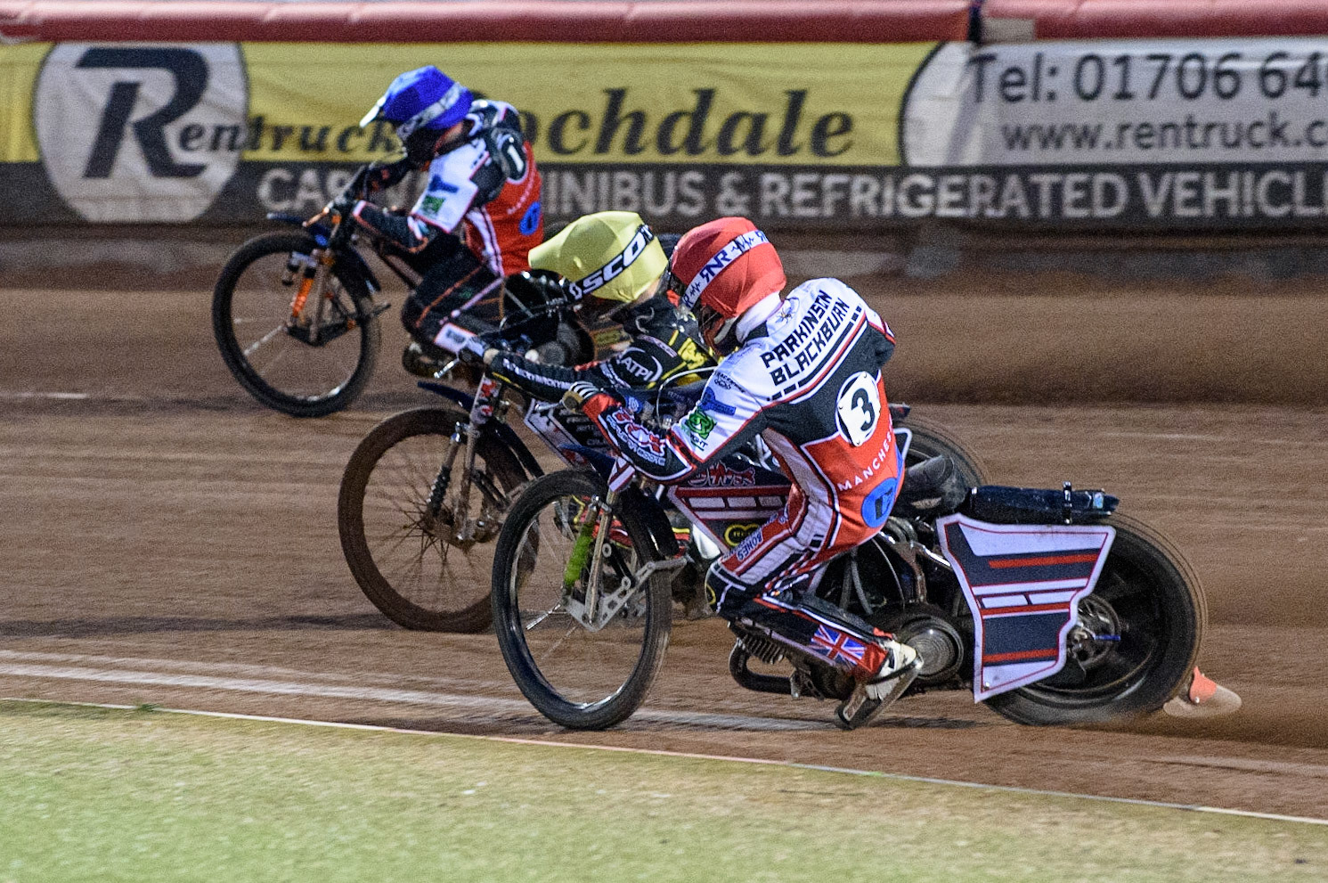 MANCHESTER, UK. JULY 29TH   Jack Parkinson-Blackburn  (Red) chases Joe Lawlor  (Yellow) and Jack Smith  (Blue) during the National Development League match between Belle Vue Colts and Leicester Lion Cubs at the National Speedway Stadium, Manchester on Thursday 29th July 2021. (Credit: Ian Charles | MI News)