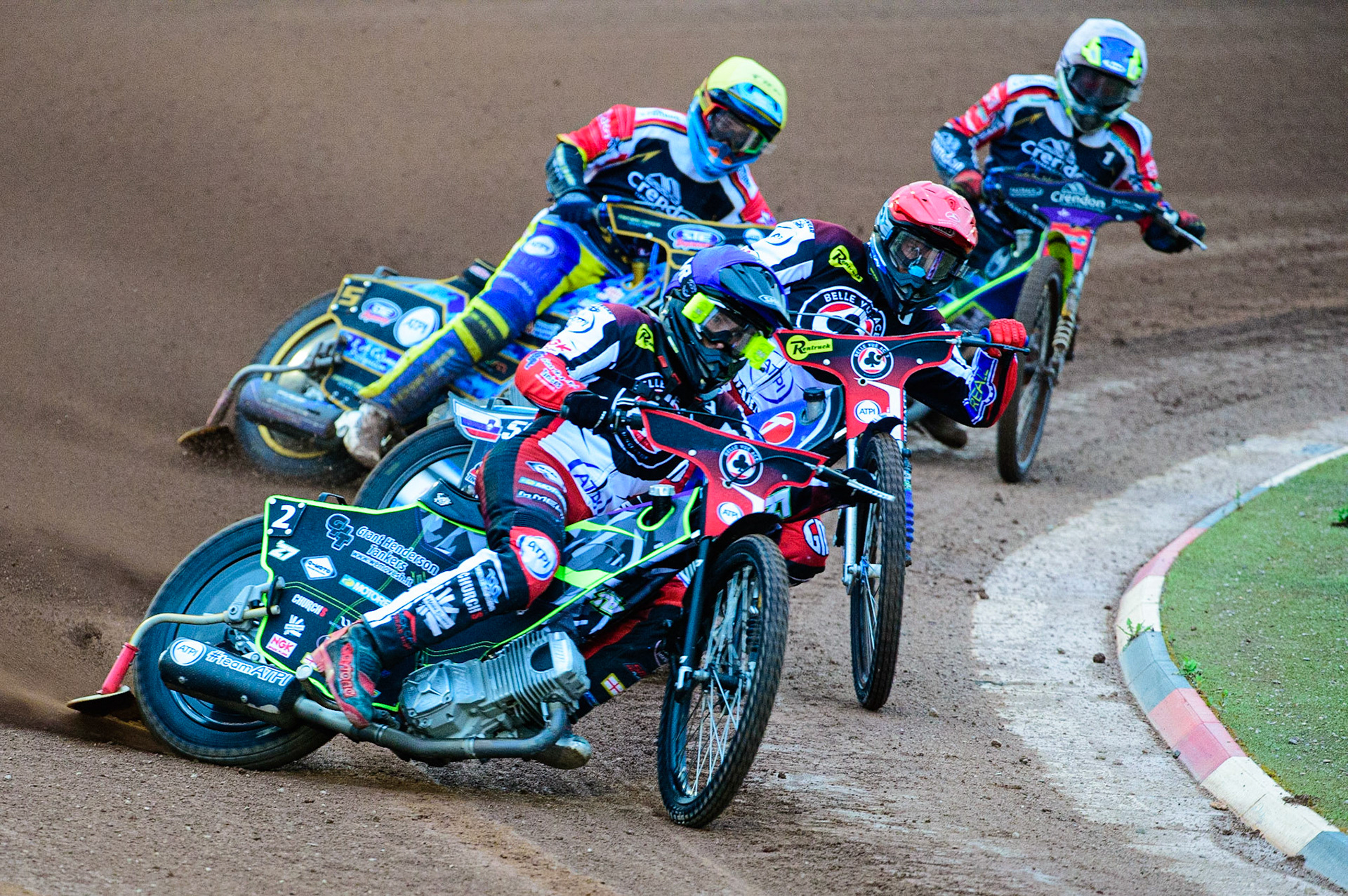 Tom Brennan (Blue) leads Matej Zagar (Red) Justin Sedgmen (Yellow) and Chris Harris  (White) during the SGB Premiership match between Belle Vue Aces and Peterborough at the National Speedway Stadium, Manchester on Monday 25th July 2022. (Credit: Ian Charles | MI News