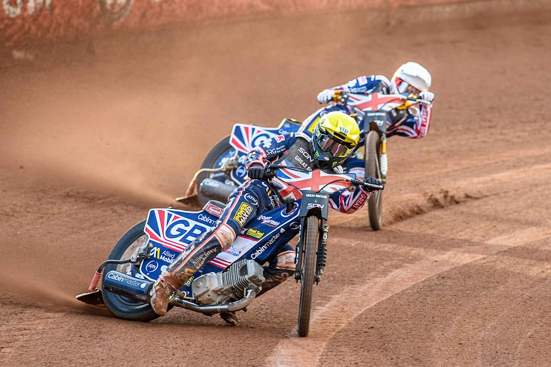 Dan Bewley of Great Britain in Yellow leading team mate Robert Lambert during the Monster Energy FIM Speedway of Nation Final at the National Speedway Stadium, Manchester on Saturday 13th July 2024. (Photo: Ian Charles | MI News)