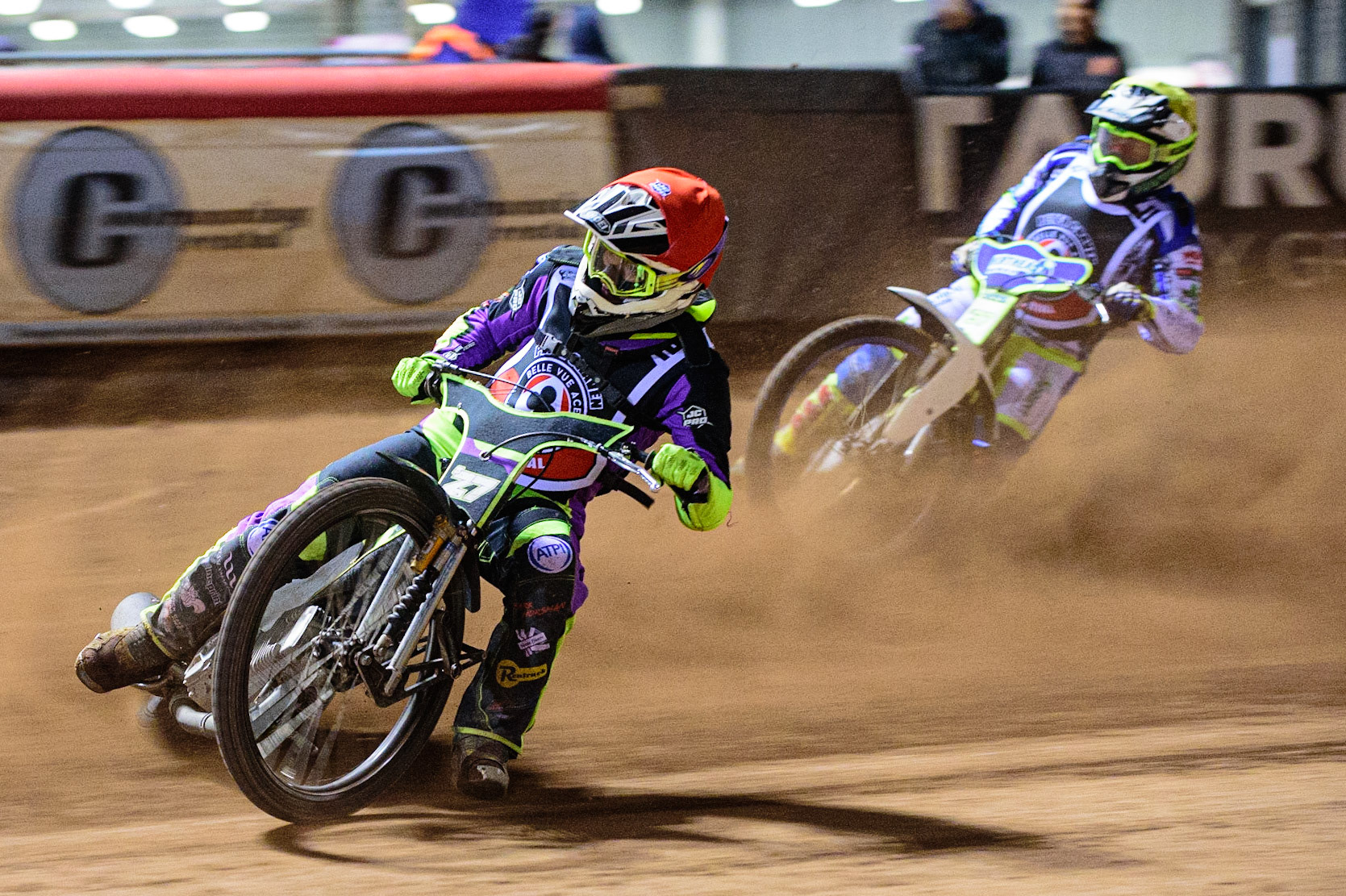 MANCHESTER, UK. OCT 23RD  Tom Brennan  (Red) leads Chris Harris  (Yellow) during the Peter Craven Memorial Trophy event at the National Speedway Stadium, Manchester on Saturday 23rd October 2021. (Credit: Ian Charles | MI News)