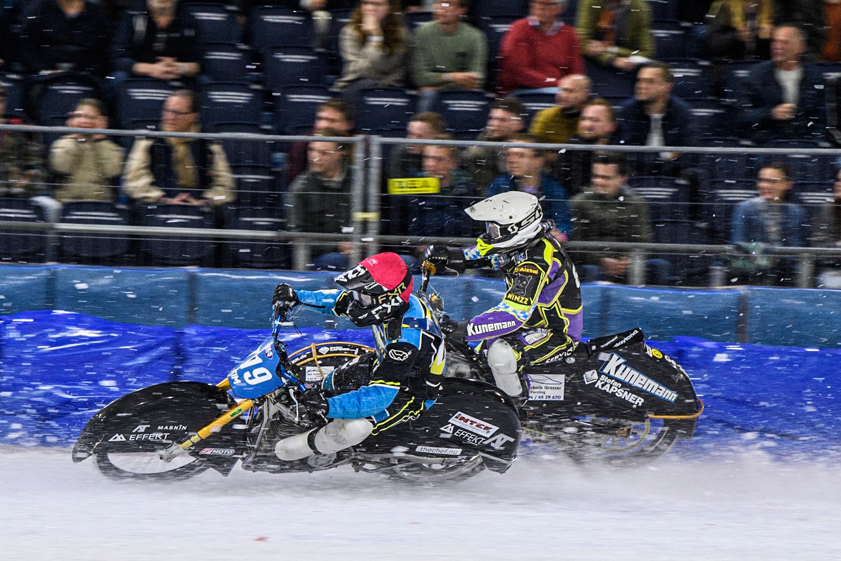 Filip Jäger (719) of Sweden in Red rides inside Max Niedermaier  (88) of Germany in White during the FIM Ice Speedway Gladiators World Championship, Final 3 at the Ice Stadium, Thialf, Heerenveen on Saturday 5th April 2025. (Photo: Ian Charles | MI News)