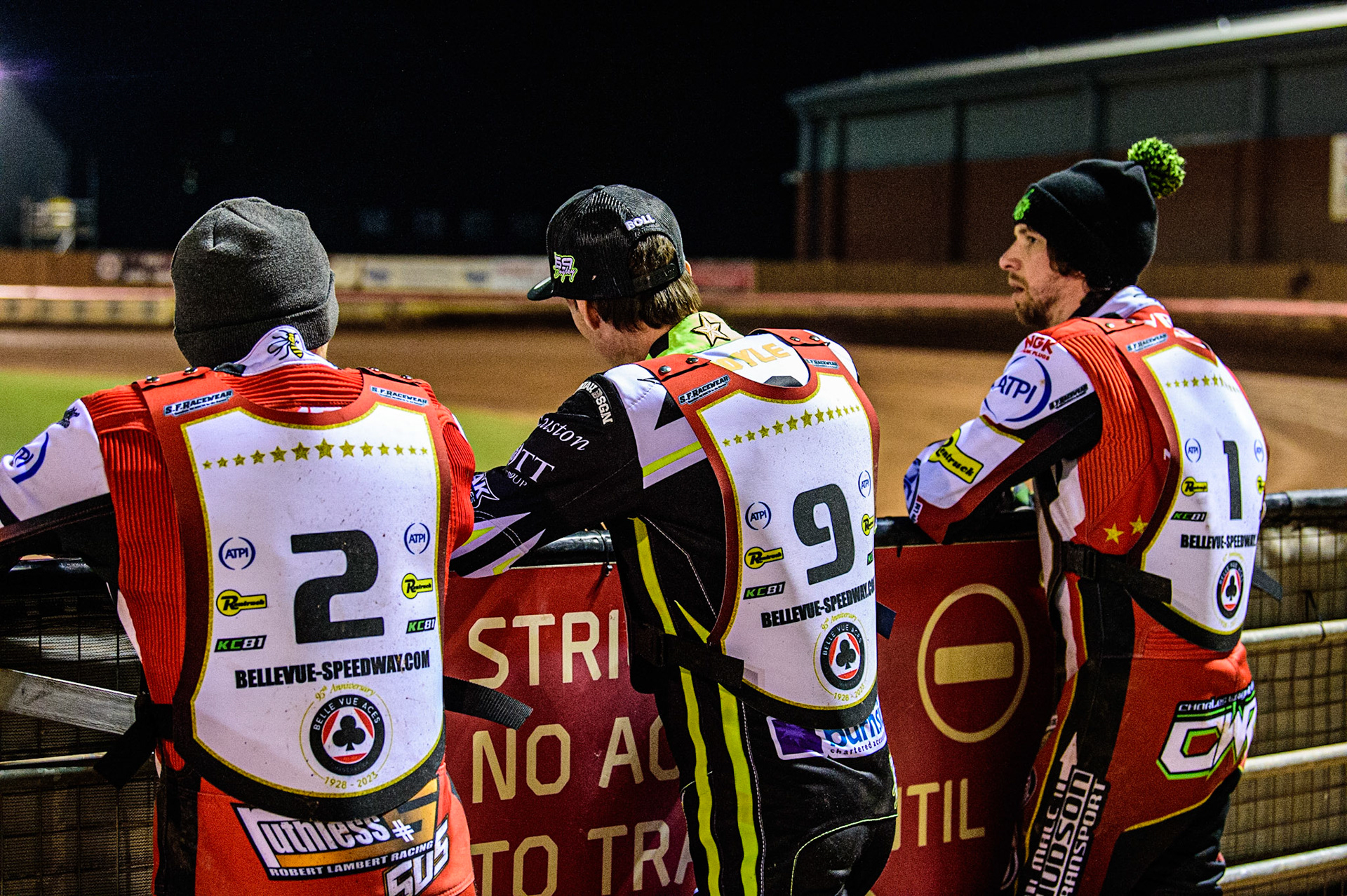 (l - r) Robert Lambert , Jason Doyle  and Charles Wright  watch the track prep during the Peter Craven Memorial Trophy  at the National Speedway Stadium, Manchester on Monday 3rd April 2023. (Photo: Ian Charles | MI News)