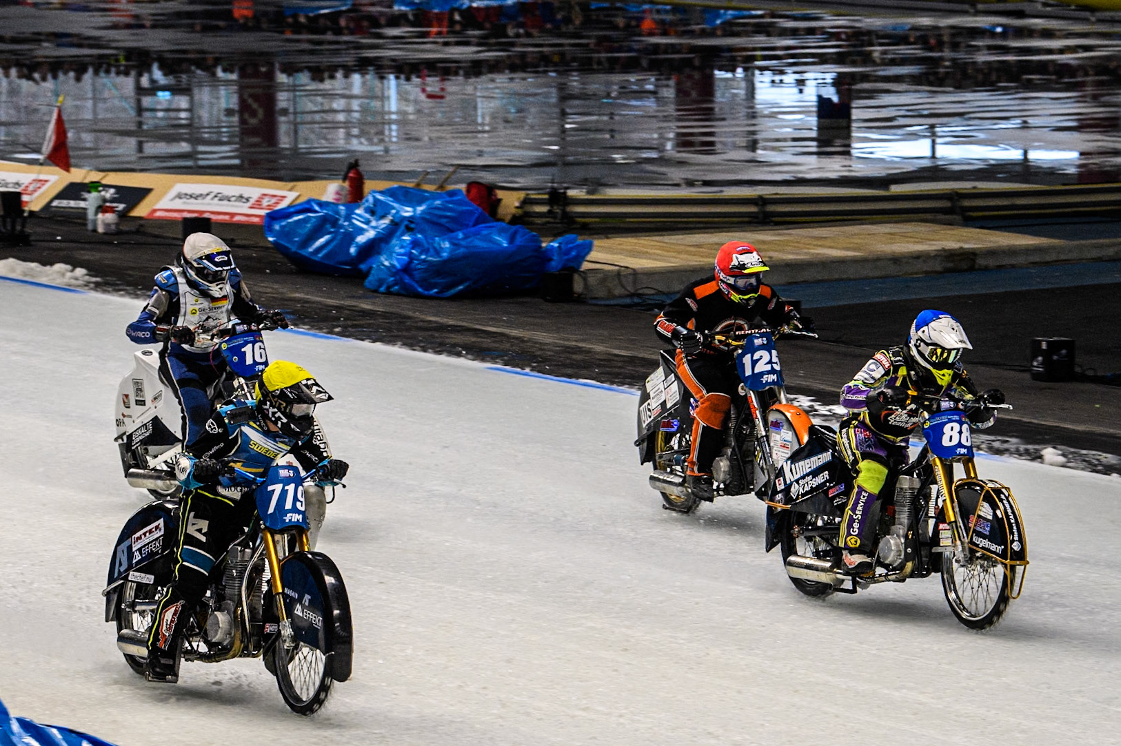 Max Niedermaier  (88) of Germany in Blue leading Filip Jäger (719) of Sweden in Yellow, Sebastian Reitsma (125) of The Netherlands in Red and Wild Card Reinhard Greisel (16) of Germany in White during the Ice Speedway Gladiators World Championship Final 2 at Max-Aicher-Arena, Inzell on Sunday 16th March 2025. (Photo: Ian Charles | MI News)