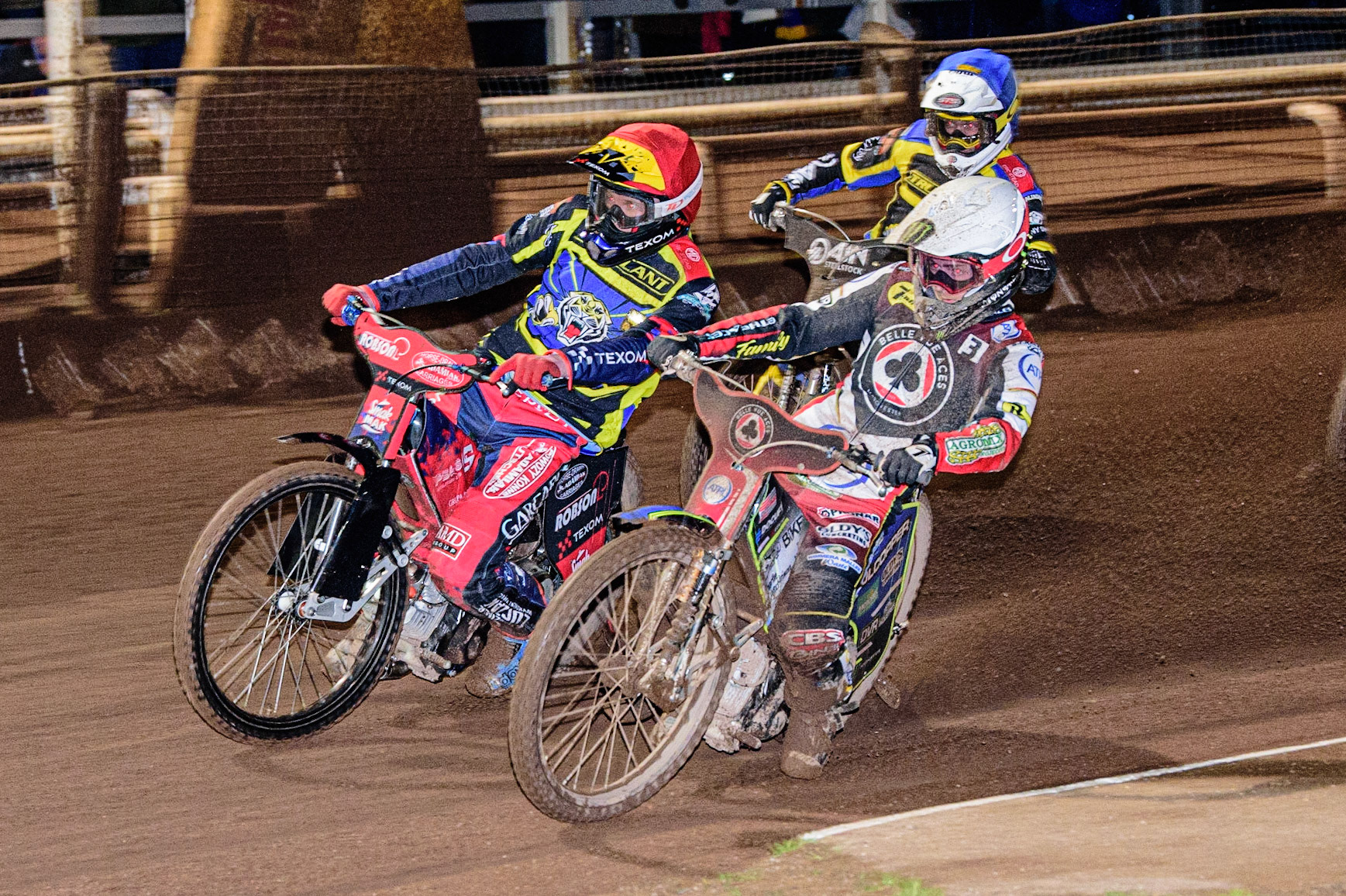 Jaimon Lidsey  (White) inside Tobiasz Musielak  (Red) with Lewis Kerr  (Blue) behind during the Sheffield Tigers vs Belle Vue Aces meeting in the SGP Premiership at Owlerton Stadium, Sheffield on Thursday 23rd March 2023. (Photo: Ian Charles | MI News)
