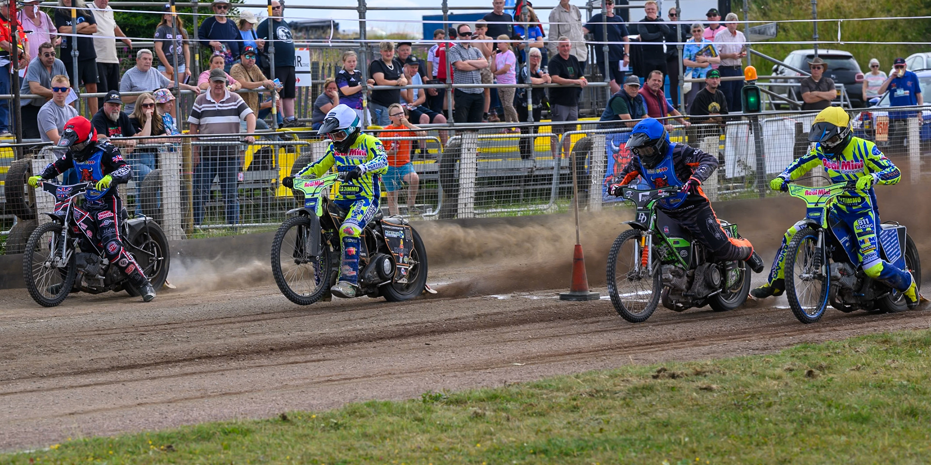 (L to R) Jack Shimelt of Buxton Bulls in Red , Ashton Vale of Oxford Chargers in White , Jack Roberts of Buxton Bulls in Blue  and Max Broadhurst of Oxford Chargers in Yellow leaving the start in heat 8 during the WSRA National Development League match between Buxton Bulls and Oxford Chargers at Hi-Edge Speedway, Buxton on Sunday 2nd August 2026. (Photo: Ian Charles | MI News)