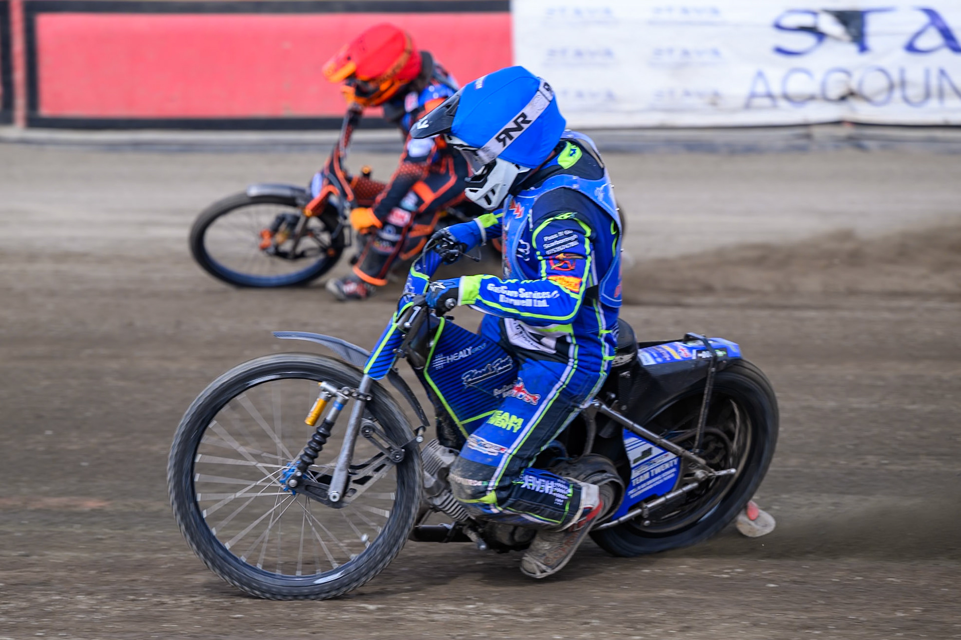 Arran Butcher of Buxton Bulls in Blue on the inside of Jack Smith of Buxton Bulls in Red during the WSRA National Development League match  between Buxton Bulls and Middlesborough Tigers at Hi-Edge Speedway, Buxton on Sunday 16th August 2026. (Photo: Ian Charles | MI News)