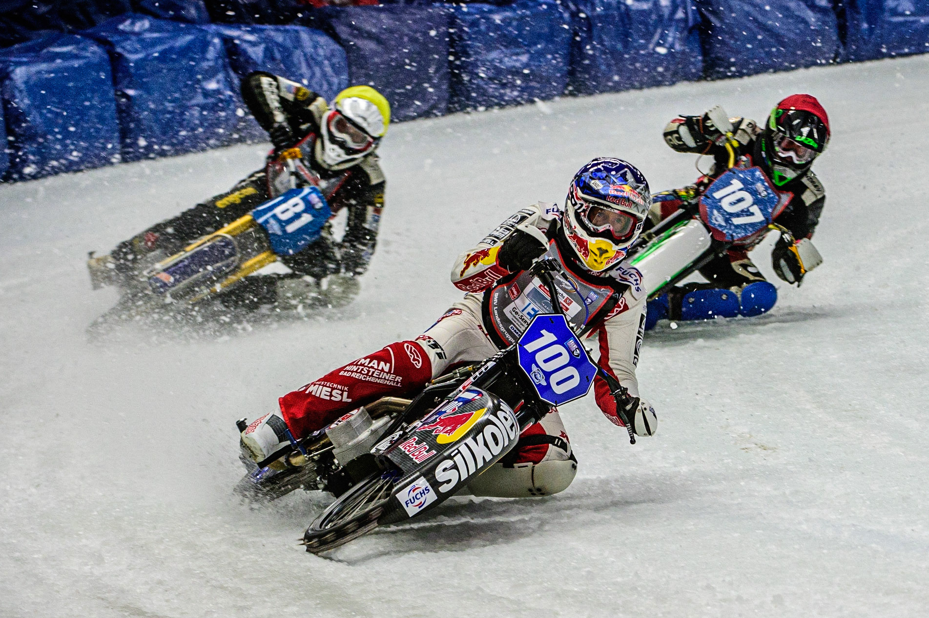 Franz Zorn (100) (Blue) leads Jimmy Olsen (81) (Yellow) and Andrej Divis (107) (Red) during the Ice Speedway Gladiators World Championship Final 1 at Max-Aicher-Arena, Inzell, Germany on Saturday 18th March 2023. (Photo: Ian Charles | MI News)