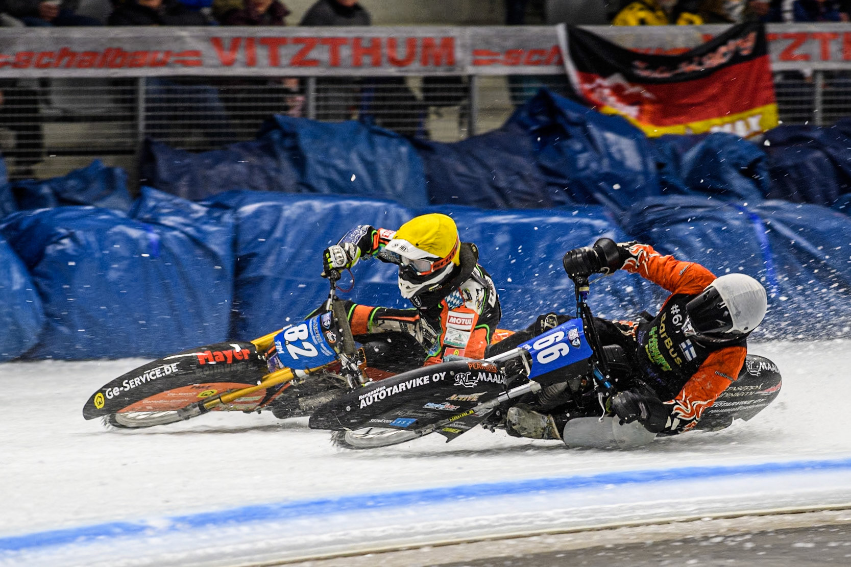 Finland's Aki Ala-Riihimäki (66) (White) inside Germany's Markus Jell (82) (Yellow) during the FIM Ice Speedway Gladiators World Championship Final 1 at the Max-Aicher-Arena, Inzell on Saturday 23 March 2024. (Photo: Ian Charles | MI News)