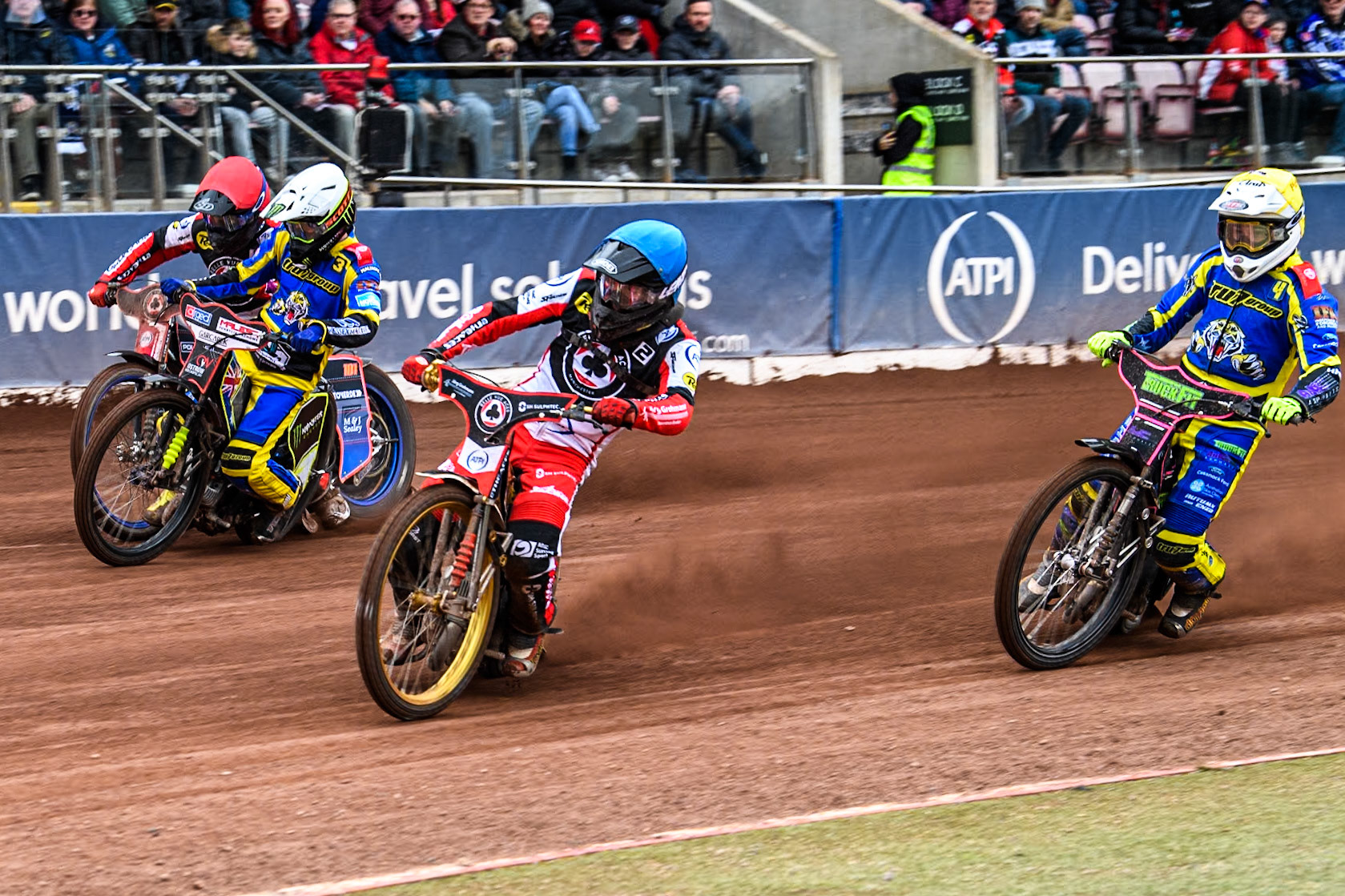 Belle Vue ATPI Aces Norick Blodorn (Blue) leads  Sheffield Tigers' Chris Holder (White), Belle Vue ATPI Aces Jaimon Lidsey (Red) and Sheffield Tigers' Josh Pickering (Yellow) during the Rowe Motor Oil Premiership KO Cup Quarter Final 1st Leg between Belle Vue Aces and Sheffield Tigers at the National Speedway Stadium, Manchester on Monday 1st April 2024. (Photo: Ian Charles | MI News)