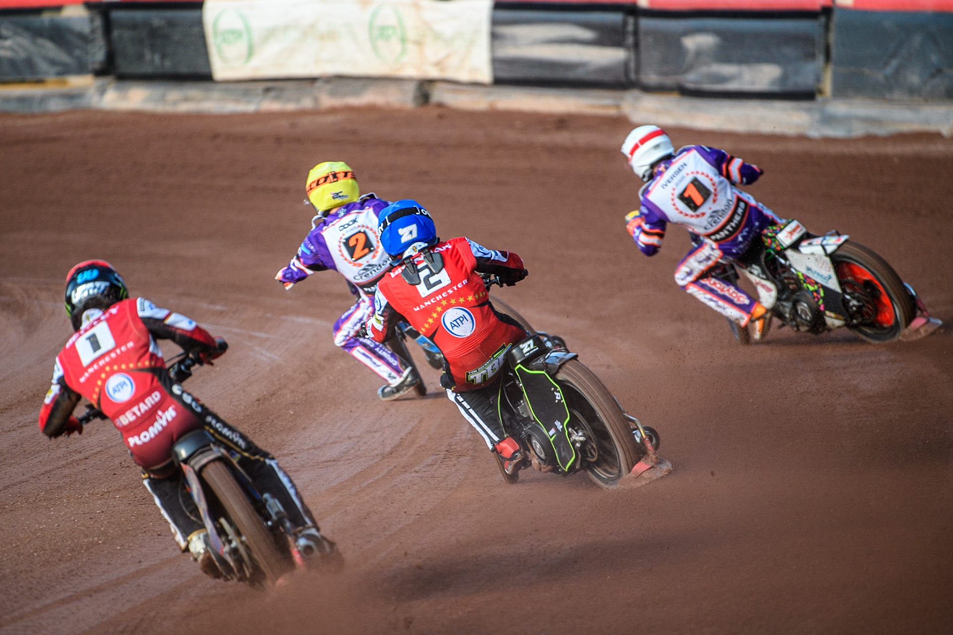 Dan Bewley (Red) chases Tom Brennan (Blue) Niels-Kristian Iversen  (White) and Ben Cook (Yellow) during the Sports Insure Premiership match between Belle Vue Aces and Peterborough at the National Speedway Stadium, Manchester on Monday 19th June 2023. (Photo: Ian Charles | MI News)