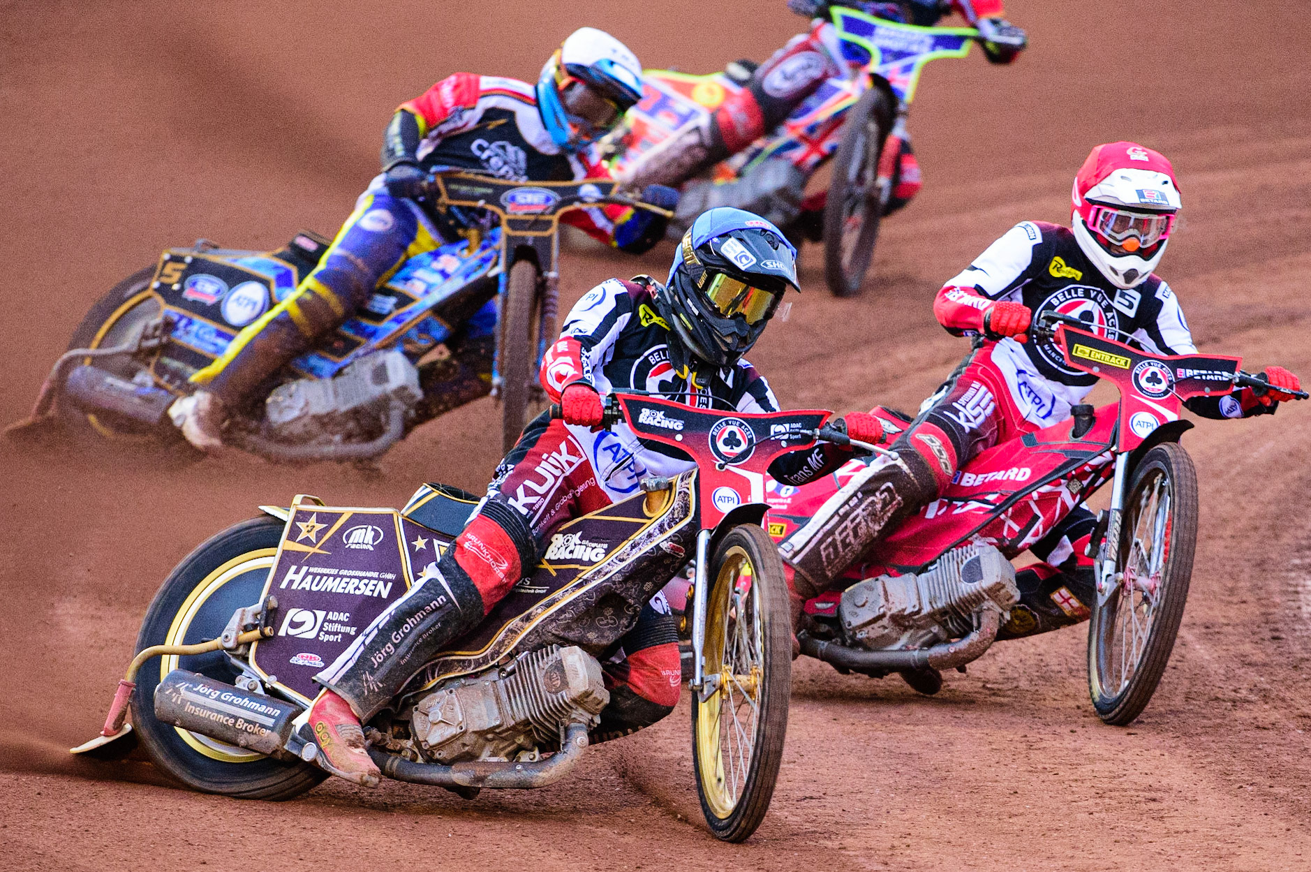 Norick Blödorn  (Blue) leads Max Fricke (Red) and Justin Sedgmen  (White) during the SGB Premiership match between Belle Vue Aces and Peterborough at the National Speedway Stadium, Manchester on Monday 25th July 2022. (Credit: Ian Charles | MI News