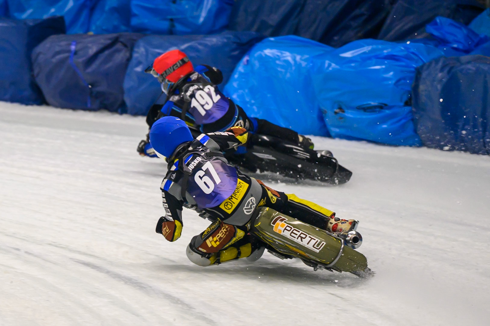Heikki Huusko (67) of Finland  in Blue chases Niclas Svensson (192) of Sweden  during the Ice Speedway Gladiators World Championship Final 1 at Max-Aicher-Arena, Inzell on Saturday 14th March 2026. (Photo: Ian Charles | MI News)