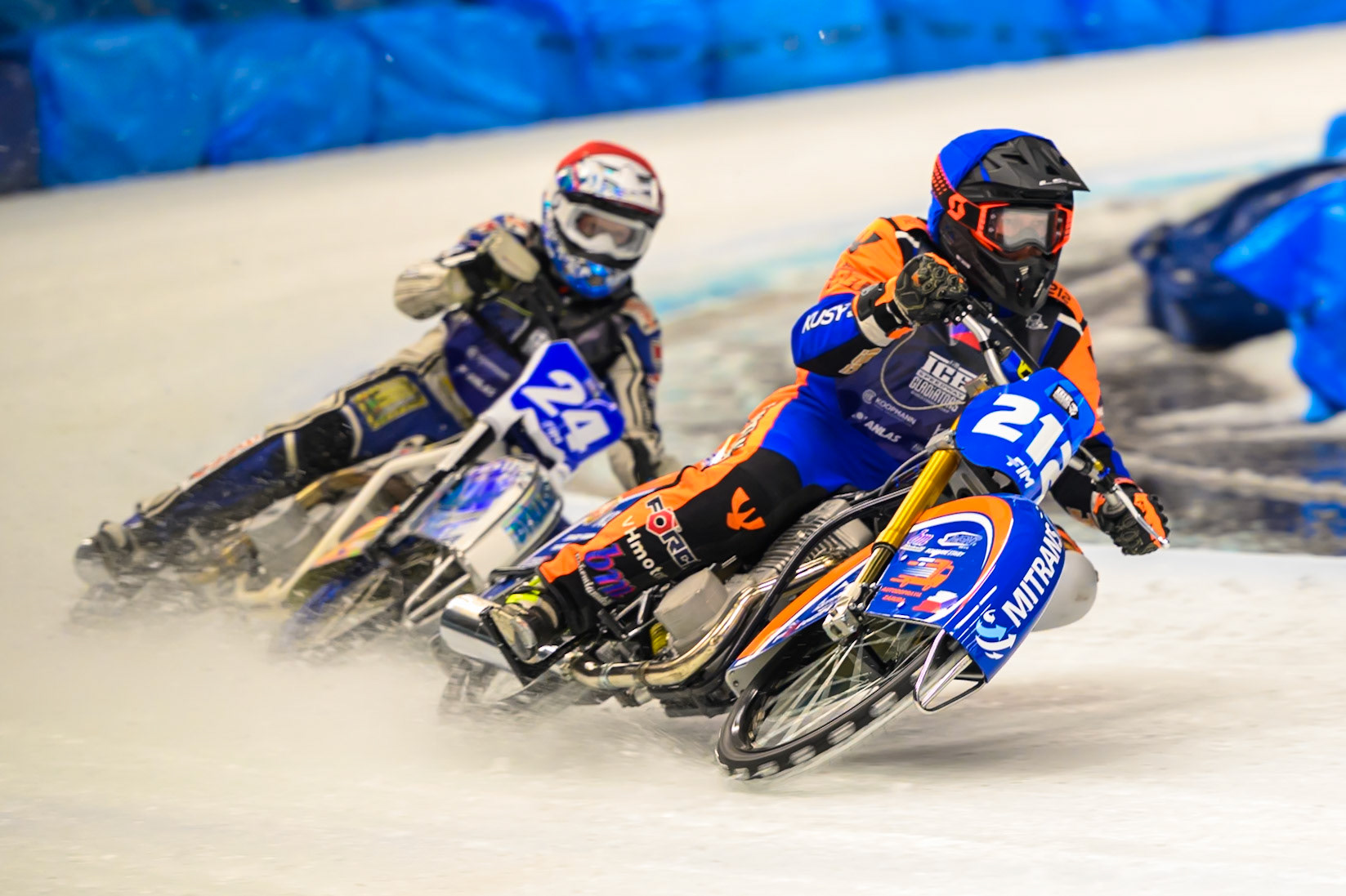 Lukas Hutla (212) of Czechia  in Blue leading Max Koivula (24) of Finland  in Red during the Ice Speedway Gladiators World Championship Final 1 at Max-Aicher-Arena, Inzell on Saturday 14th March 2026. (Photo: Ian Charles | MI News)