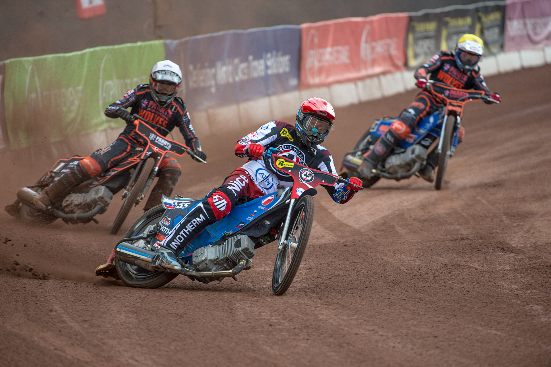 MANCHESTER, UK. JUN 13TH Matej Zagar (Red) leads Sam Masters  (White) and Steve Worrall  (Yellow) during the SGB Premiership match between Belle Vue Aces and Wolverhampton  Wolves at the National Speedway Stadium, Manchester on Monday 13th June 2022. (Credit: Ian Charles | MI News)