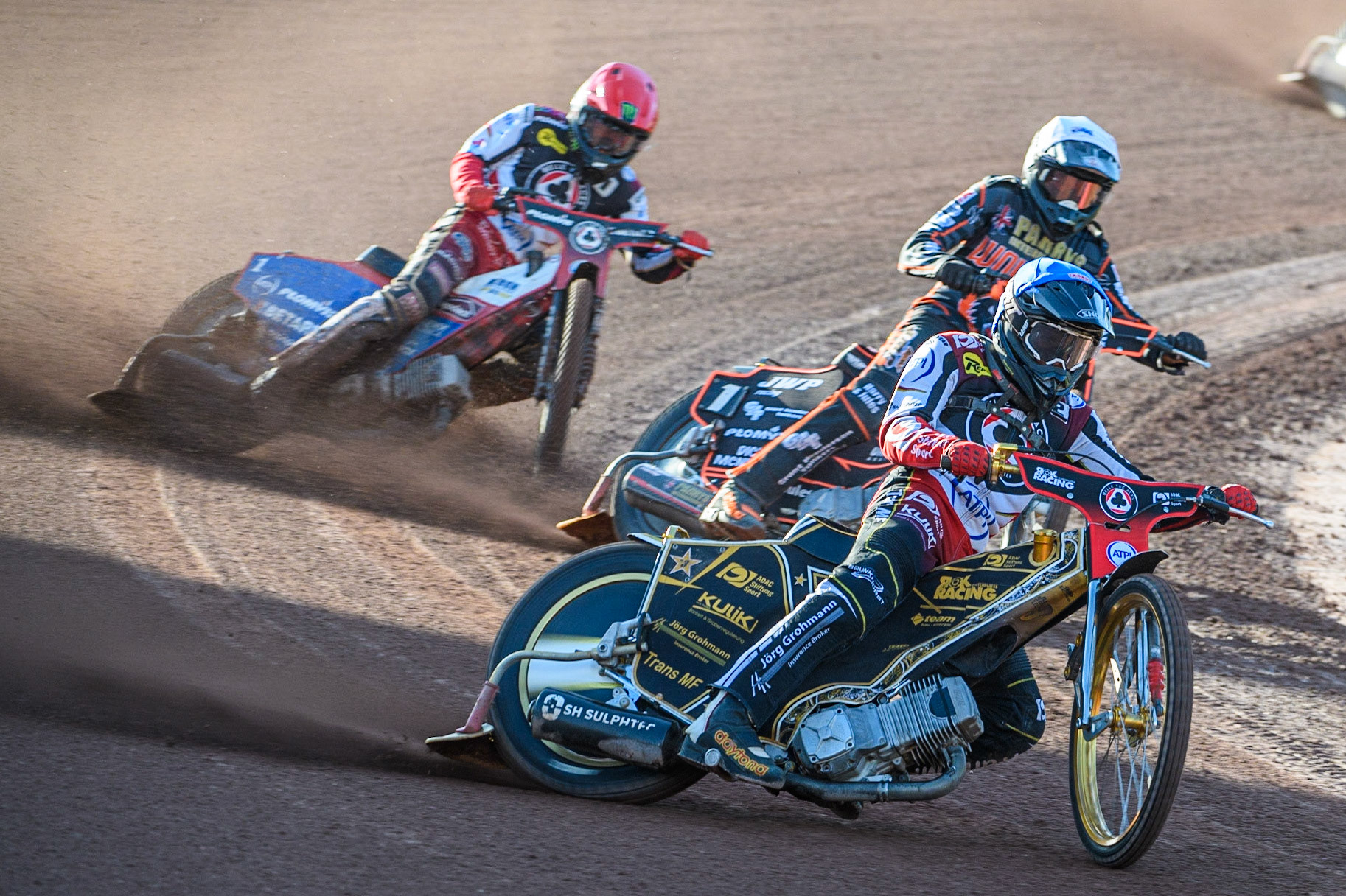 Norick Blodorn (Blue) leads Sam Masters (White) and Dan Bewley (Red) during the Sports Insure Premiership match between Belle Vue Aces and Wolverhampton Wolves at the National Speedway Stadium, Manchester on Monday 3rd July 2023. (Photo: Ian Charles | MI News)