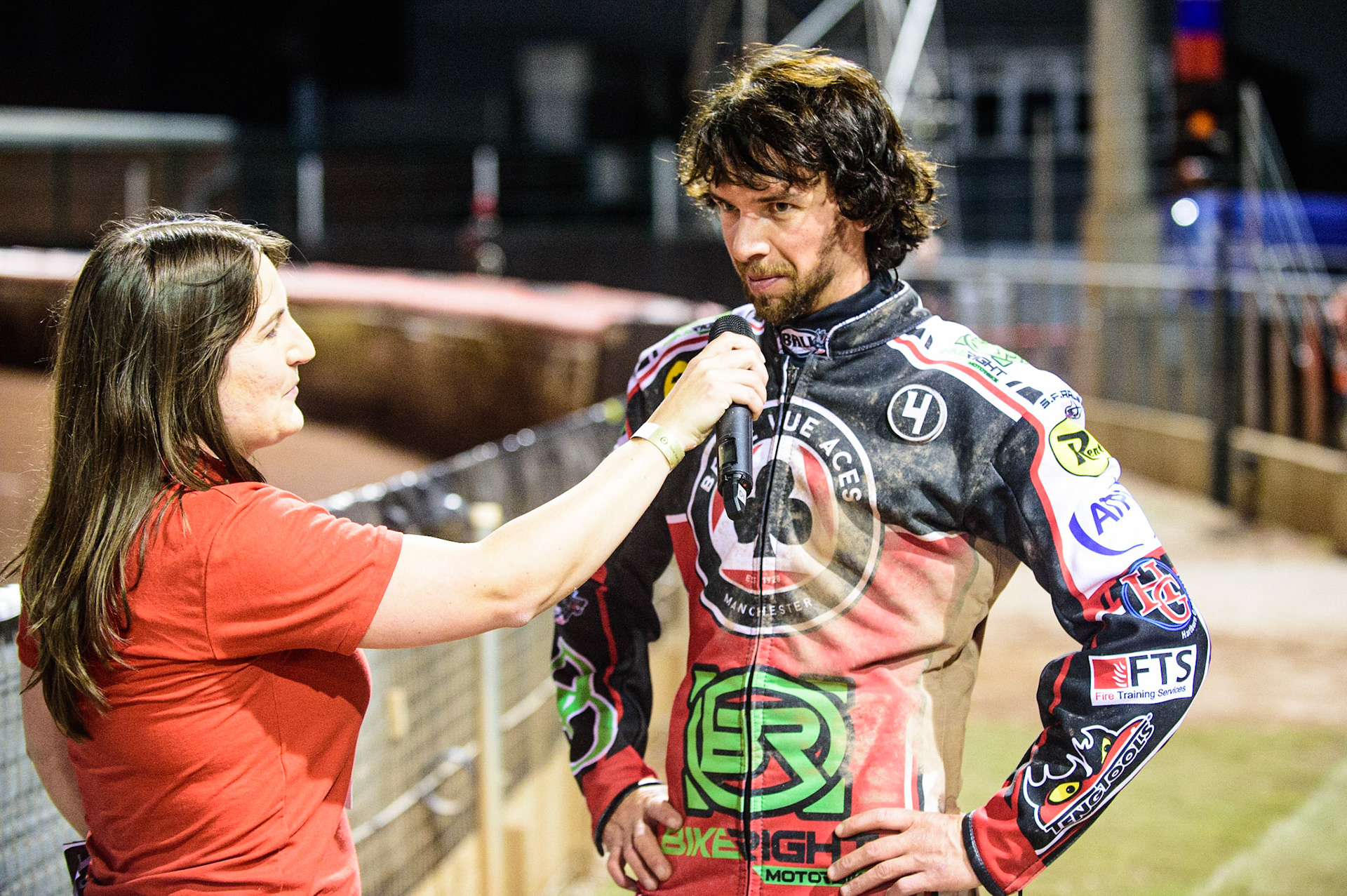 MANCHESTER, UK. OCT 7TH  Charles Wright (right) gives his reactions to Meeting presenter Hayley Bromley during the SGB Premiership Play off Semi-Final Second Leg between Belle Vue Aces and Sheffield Tigers at the National Speedway Stadium, Manchester on Thursday 7th October 2021. (Credit: Ian Charles | MI News)