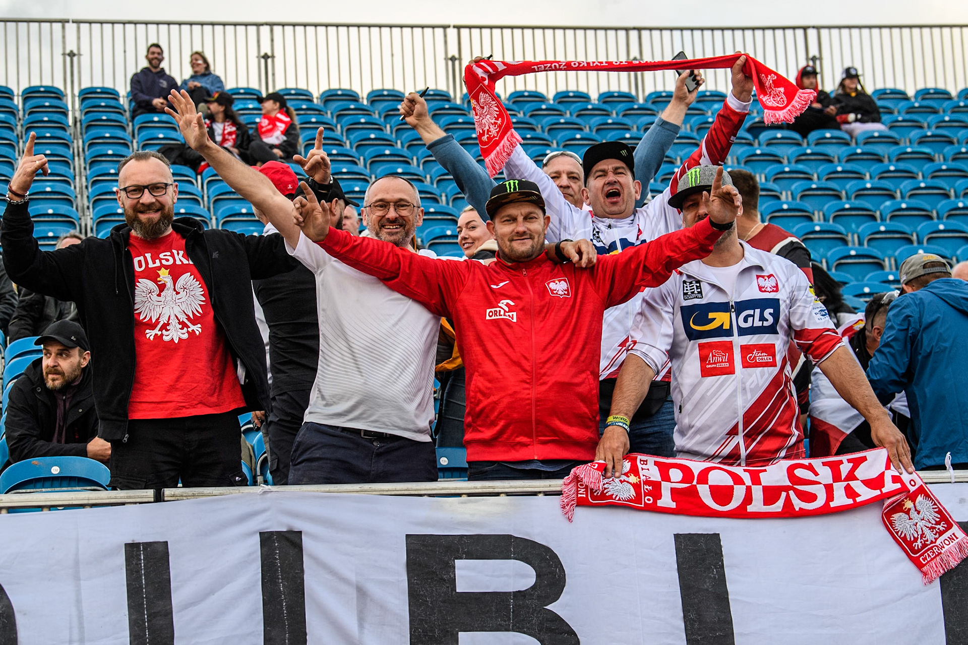 Polish fans in the East Stand at the NSS in jovial mood during the Monster Energy FIM Speedway of Nation Final at the National Speedway Stadium, Manchester on Saturday 13th July 2024. (Photo: Ian Charles | MI News)