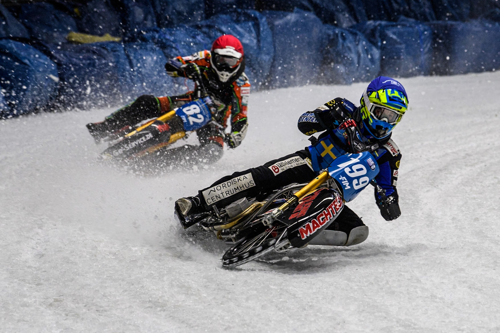 Sweden's Martin Haarahiltunen (199)  (Blue) leads  Germany's Markus Jell (82) (Red) during the FIM Ice Speedway Gladiators World Championship Final 2 at the Max-Aicher-Arena, Inzell on Sunday 24 March 2024. (Photo: Ian Charles | MI News)