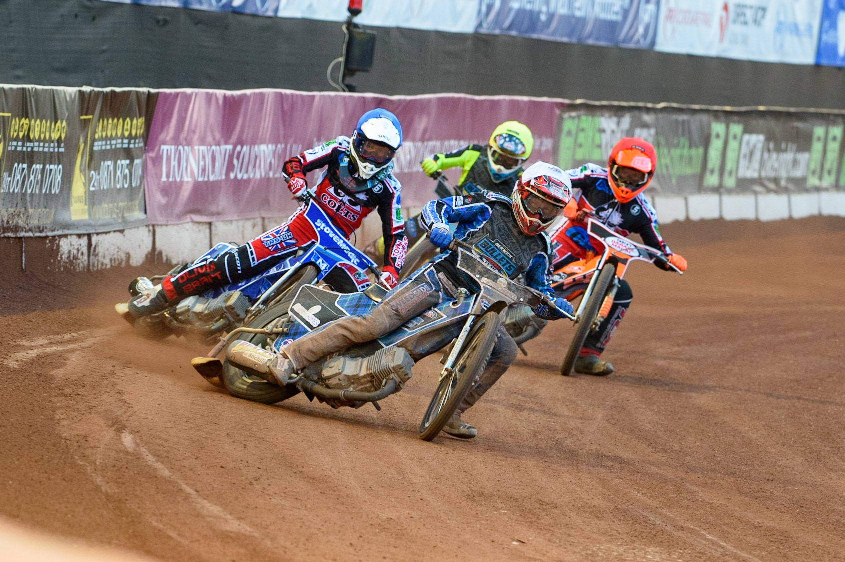 MANCHESTER, UK. MAY 28TH  Greg Blair  (White) leads Harry McGurk  (Blue) and Connor Coles  (Red) with Mason Watson  (Yellow) behind during the SGB National Development League match between Belle Vue Colts and Berwick Bullets at the National Speedway Stadium, Manchester on Friday 28th May 2021. (Credit: Ian Charles | MI News)