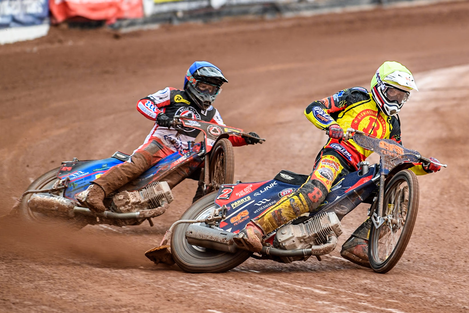 Birmingham Brummies' Steve Worrall  in Yellow leading Belle Vue Aces' Ben Cook  in Blue during the Rowe Motor Oil Premiership match between Belle Vue Aces and Birmingham Brummies at the National Speedway Stadium, Manchester on Monday 6th May 2024. (Photo: Ian Charles | MI News)