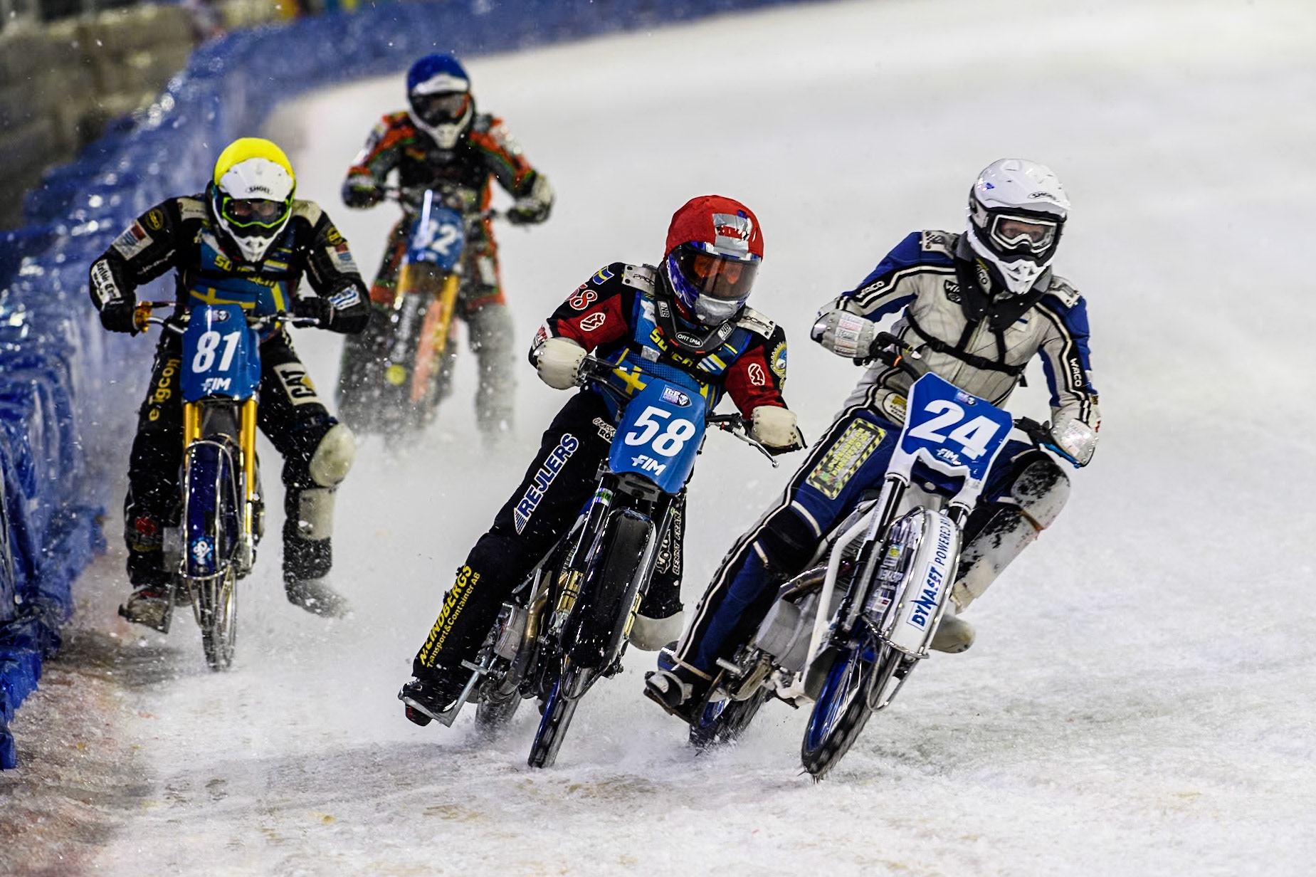 Finland's Max Koivula (24) in White rides inside Sweden's Stefan Svensson (58) in Red with Sweden"s Jimmy Olsén (81) in Yellow and Germany's Markus Jell (82) in Blue behind during the FIM Ice Speedway Gladiators World Championship Final 4 at Ice Rink Thialf, Heerenveen on Sunday 7th April 2024. (Photo: Ian Charles | MI News)