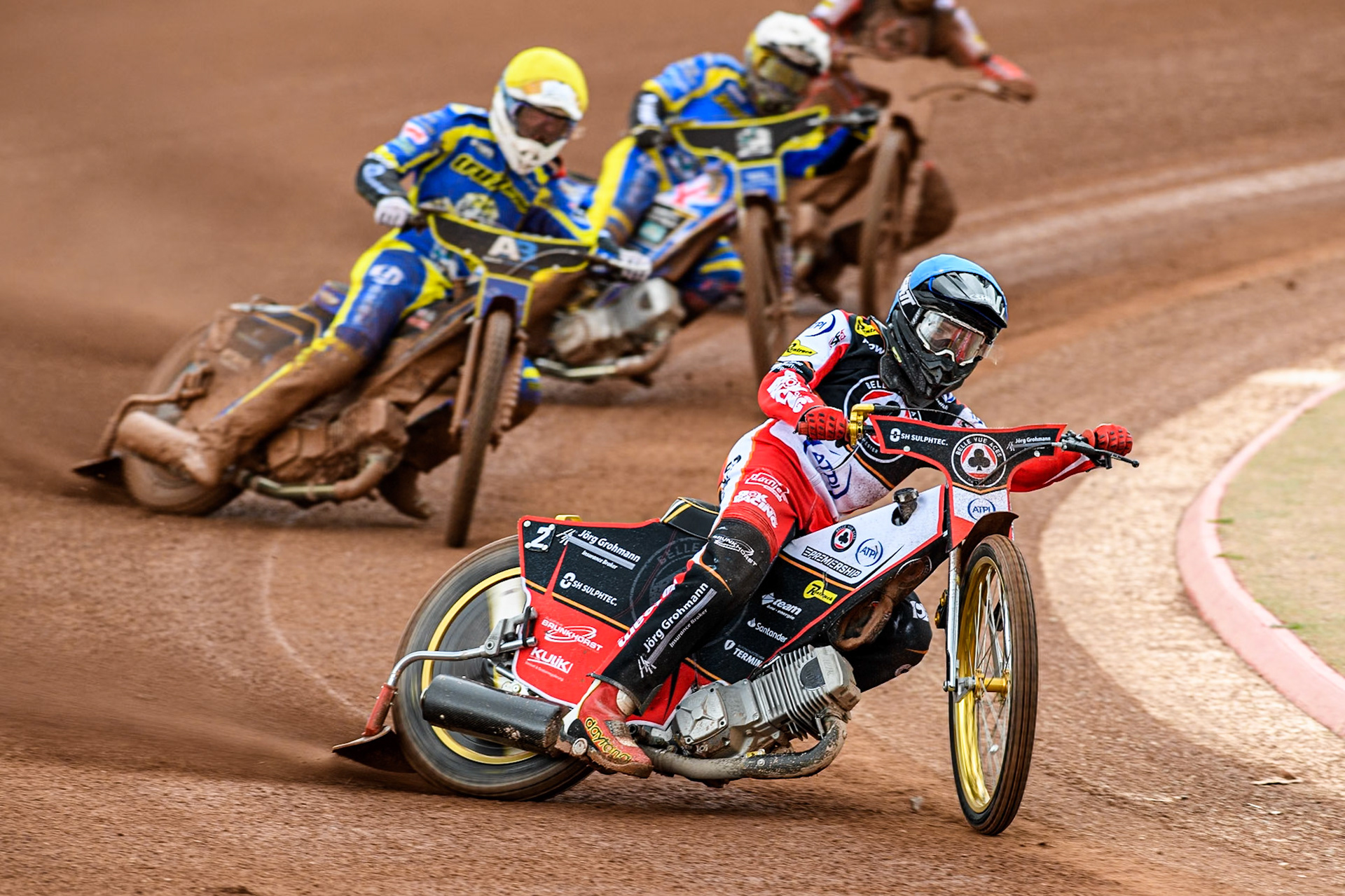 Norick Blödorn of Belle Vue Aces in Blue leading Anders Rowe of Sheffield Tigers in Yellow and Jack Holder of Sheffield Tigers in White during the Rowe Motor Oil Premiership match between Belle Vue Aces and Sheffield Tigers at the National Speedway Stadium, Manchester on Monday 5th May 2025. (Photo: Ian Charles | MI News)