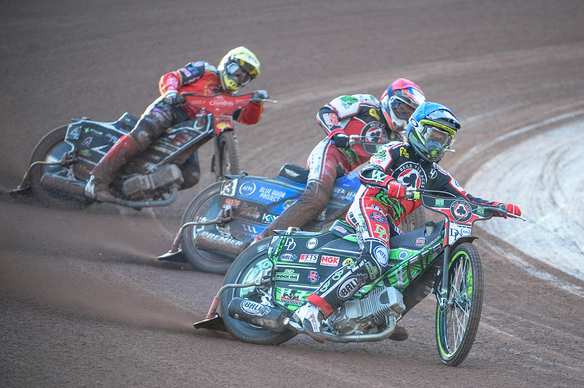 MANCHESTER, UK. AUG 9TH Charles Wright (Blue) leads Steve Worrall  (Red) and Scott Nicholls  (Yellow)  during the SGB Premiership match between Belle Vue Aces and Peterborough at the National Speedway Stadium, Manchester on Monday 9th August 2021. (Credit: Ian Charles | MI News)