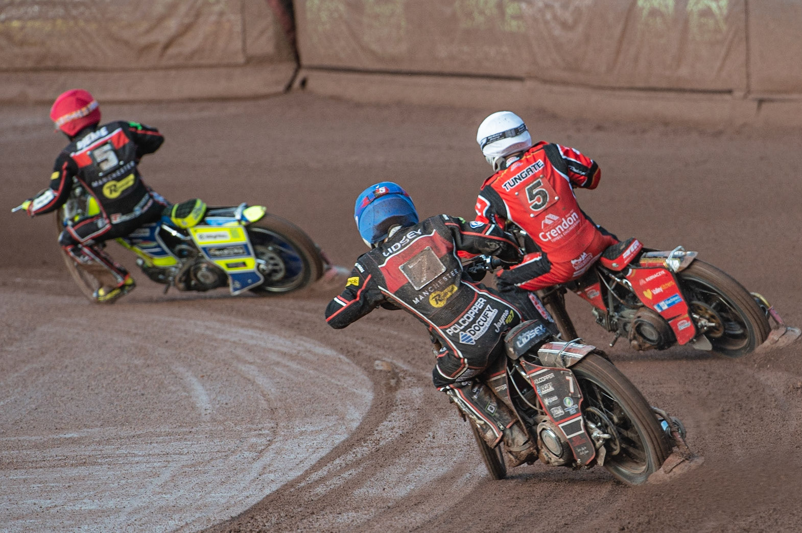 Photo by Ian Charles:


Jaimon Lidsey  (Blue) chases Rohan Tungate (White) and Kenneth Bjerre  (Red)

Belle Vue Aces v Peterborough Panthers, British Speedway Premiership, National Speedway Stadium, Manchester, Thursday, 13, June, 2019