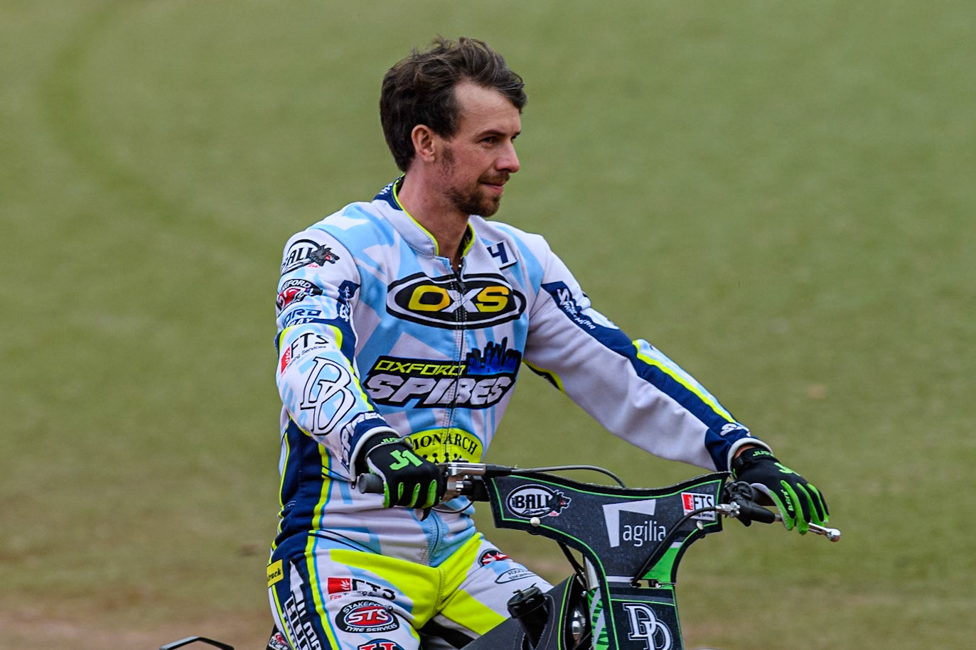 Oxford Spires' Charles Wright on the parade lap during the Rowe Motor Oil Premiership match between Belle Vue Aces and Oxford Spires at the National Speedway Stadium, Manchester on Monday 22nd July 2024. (Photo: Ian Charles | MI News)