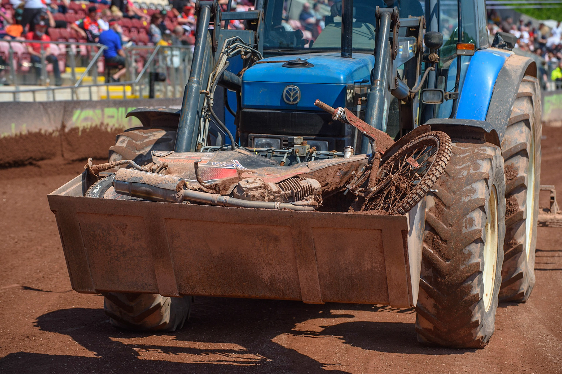 MANCHESTER, UK. MAY 31ST  The tractor brings Jordan Palin’s bike back to the pits after his fall. The bike was too badly damaged to be pushed during the SGB Premiership match between Belle Vue Aces and Peterborough at the National Speedway Stadium, Manchester on Monday 31st May 2021. (Credit: Ian Charles | MI News)