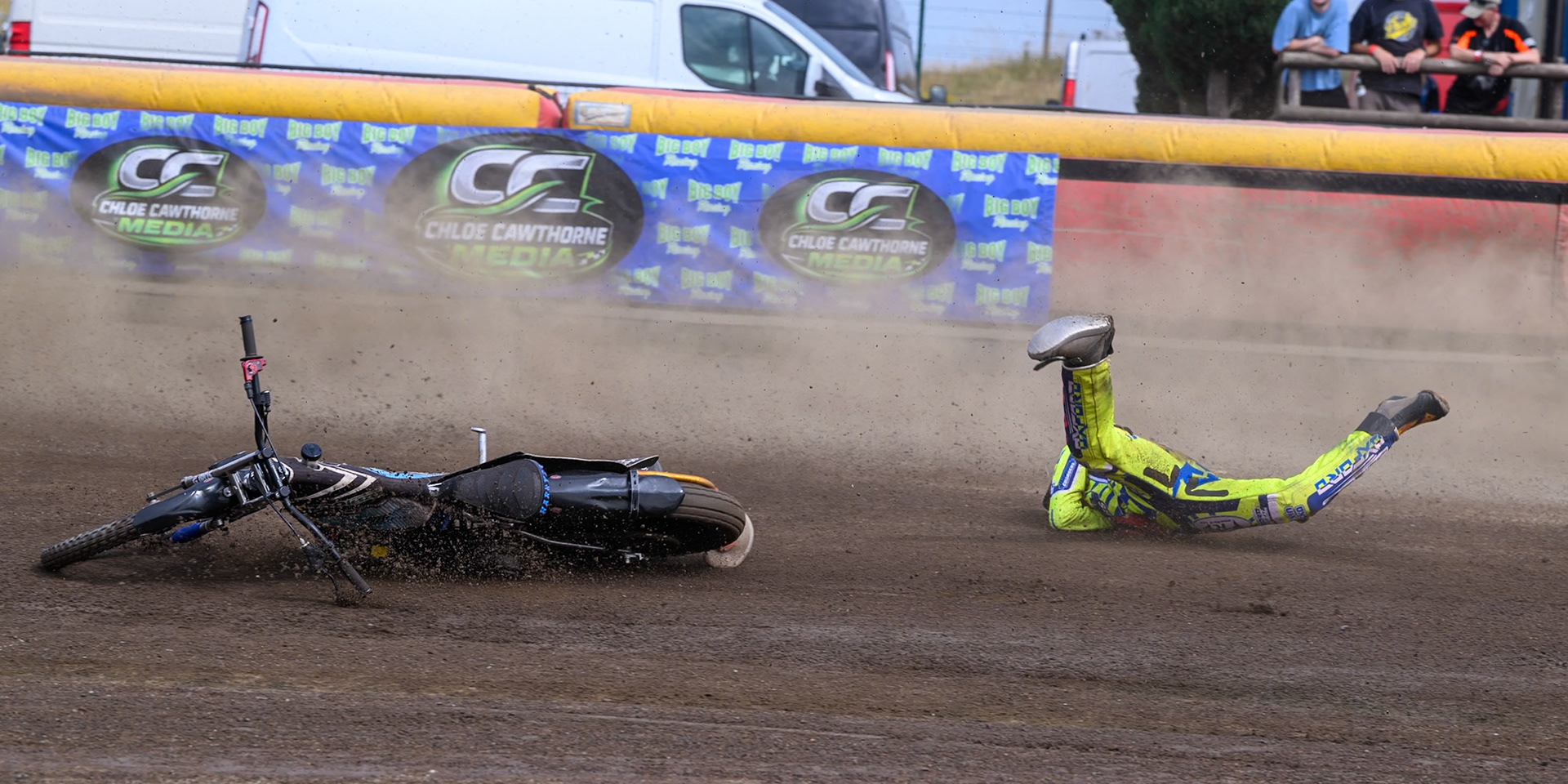 Harry Fletcher of Oxford Chargers in Yellow  falls during the WSRA National Development League match between Buxton Bulls and Oxford Chargers at Hi-Edge Speedway, Buxton on Sunday 2nd August 2026. (Photo: Ian Charles | MI News)