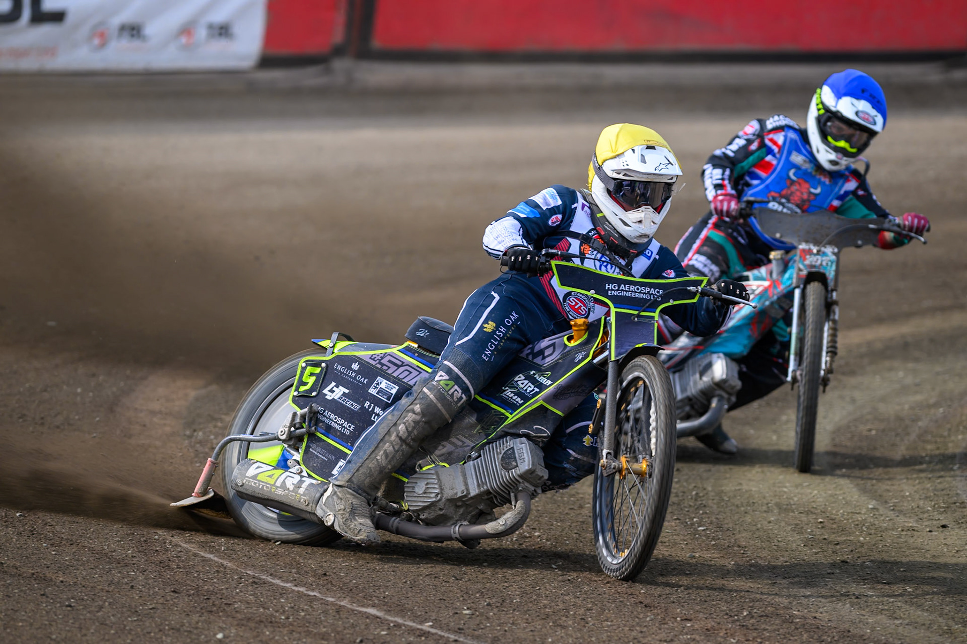 Nathan Ablitt of Middlesborough Tigers in Yellow  leading Alfie Bowtell of Buxton Bulls in Blue during the WSRA National Development League match  between Buxton Bulls and Middlesborough Tigers at Hi-Edge Speedway, Buxton on Sunday 16th August 2026. (Photo: Ian Charles | MI News)