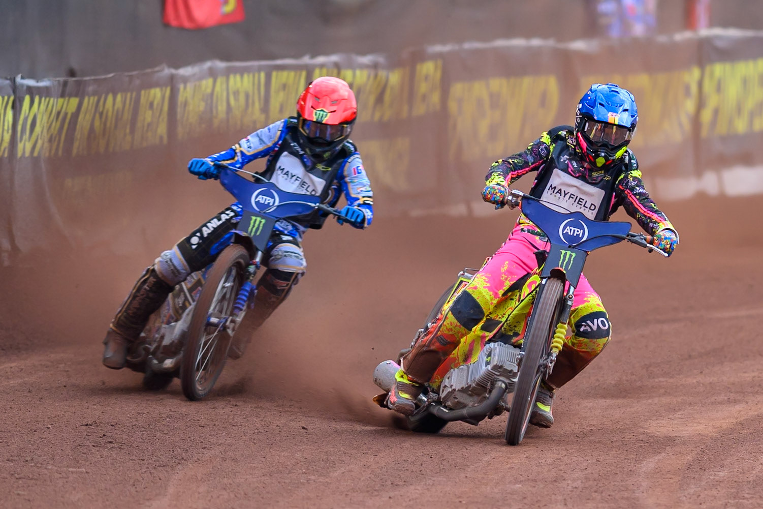 Michael Jepsen Jensen (52) of Denmark in Blue passes Jack Holder (25) of Australia in Red on the inside during the ATPI  FIM Speedway GP of Manchester at the National Speedway Stadium, Manchester on Saturday 6th June 2026. (Photo: Ian Charles | MI News)