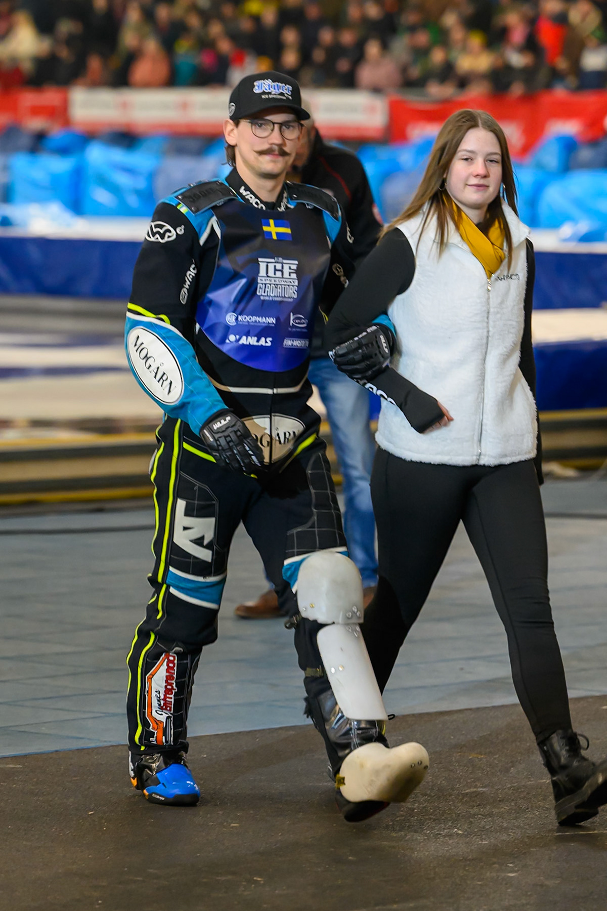Filip Jäger (719) of Sweden is accompanied by a start girl  during the Ice Speedway Gladiators World Championship Final 2 at Max-Aicher-Arena, Inzell on Sunday 15th March 2026. (Photo: Ian Charles | MI News)