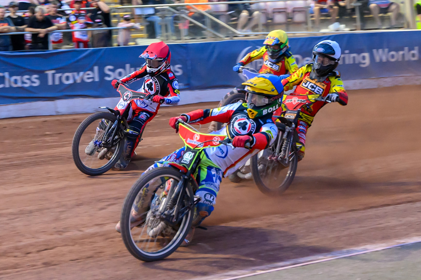 Mitch McDiarmid, Guest Rider for Belle Vue Aces in Blue leading Zach Cook of Belle Vue Aces in Red Dan Thompson of Leicester Lions in White  and Jonas Jeppesen Guest rider for Leicester Lions in Yellow during the Rowe Motor Oil Premiership match between Belle Vue Aces and Leicester Lions at the National Speedway Stadium, Manchester on Monday 3rd August 2026. (Photo: Ian Charles | MI News)