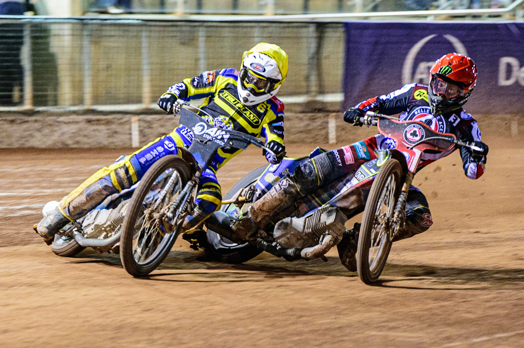 Lewis Kerr  (Yellow) leads Jaimon Lidsey  (Red) during the SGB Premiership match between Belle Vue Aces and Sheffield Tigers at the National Speedway Stadium, Manchester on Monday 27th March 2023. (Photo: Ian Charles | MI News)