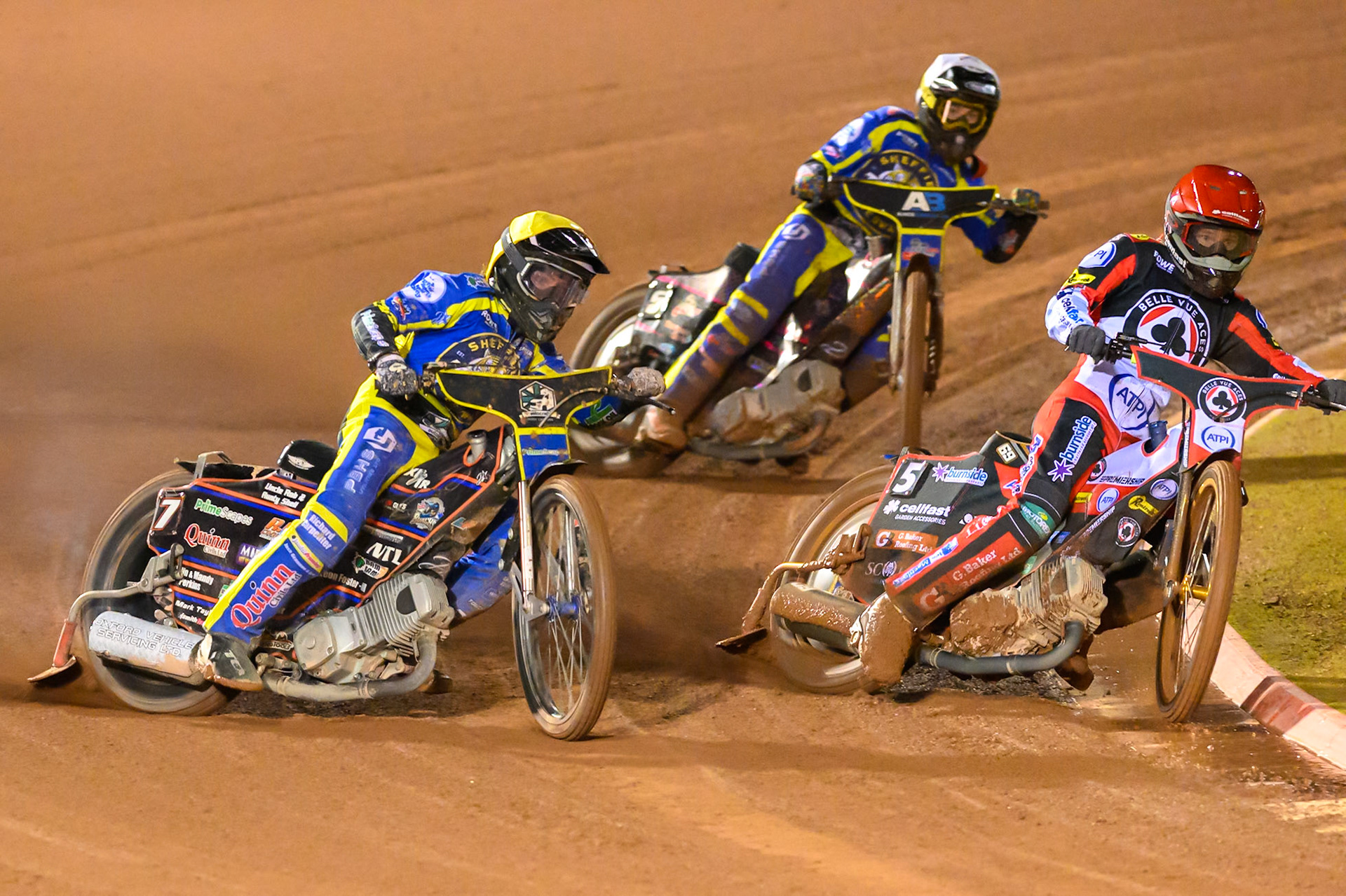 Jason Doyle of Belle Vue Aces in Red on the inside of Luke Killeen of Sheffield Tigers in Yellow  with Josh Pickering of Sheffield Tigers in White behind during the Rowe Motor Oil Premiership Grand Final 2nd Leg between Belle Vue Aces and Sheffield Tigers at the National Speedway Stadium, Manchester on Friday 16th October 2026. (Photo: Ian Charles | MI News)