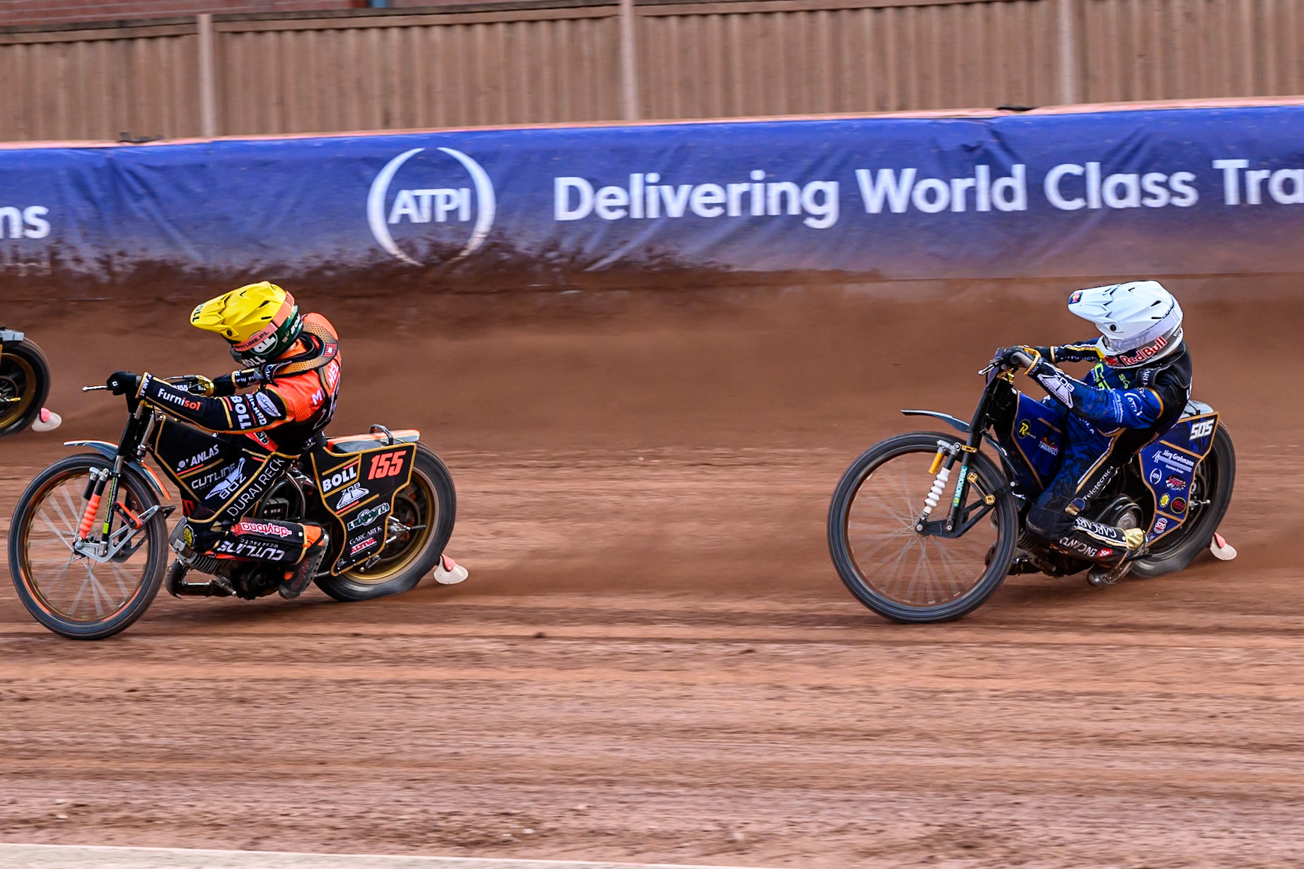 Robert Lambert (505) of Great Britain in White chases Mikkel Michelsen (155) of Denmark in Yellow during the ATPI FIM Speedway Grand Prix Round 4 at the National Speedway Stadium, Manchester, on Friday 13th June 2025. (Photo: Ian Charles | MI News)