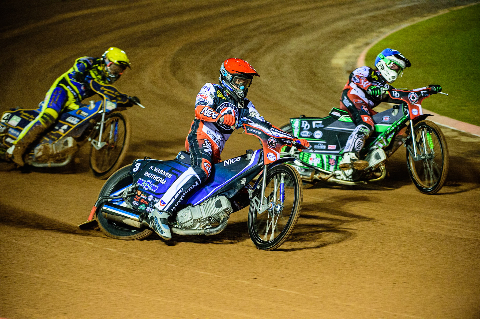 Matej Zagar (Red) outside Charles Wright  (Blue) with Kyle Howarth (Yellow) behind during the SGB Premiership Grand Final 1st leg between Belle Vue Aces and Sheffield Tigers at the National Speedway Stadium, Manchester on Monday 10th October 2022. (Credit: Ian Charles | MI News)