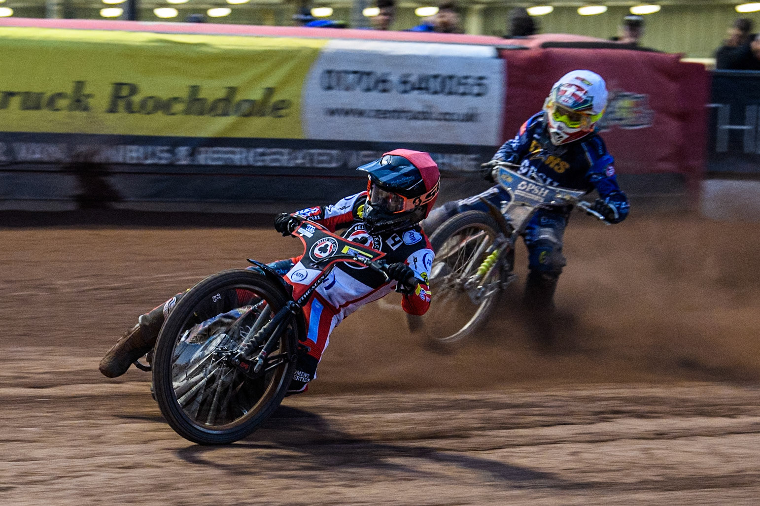Belle Vue Aces' Ben Cook in Red passes King Lynn Stars' Michael Palm Toft in White during the Rowe Motor Oil Premiership match between Belle Vue Aces and King's Lynn Stars at the National Speedway Stadium, Manchester on Monday 20th May 2024. (Photo: Ian Charles | MI News)