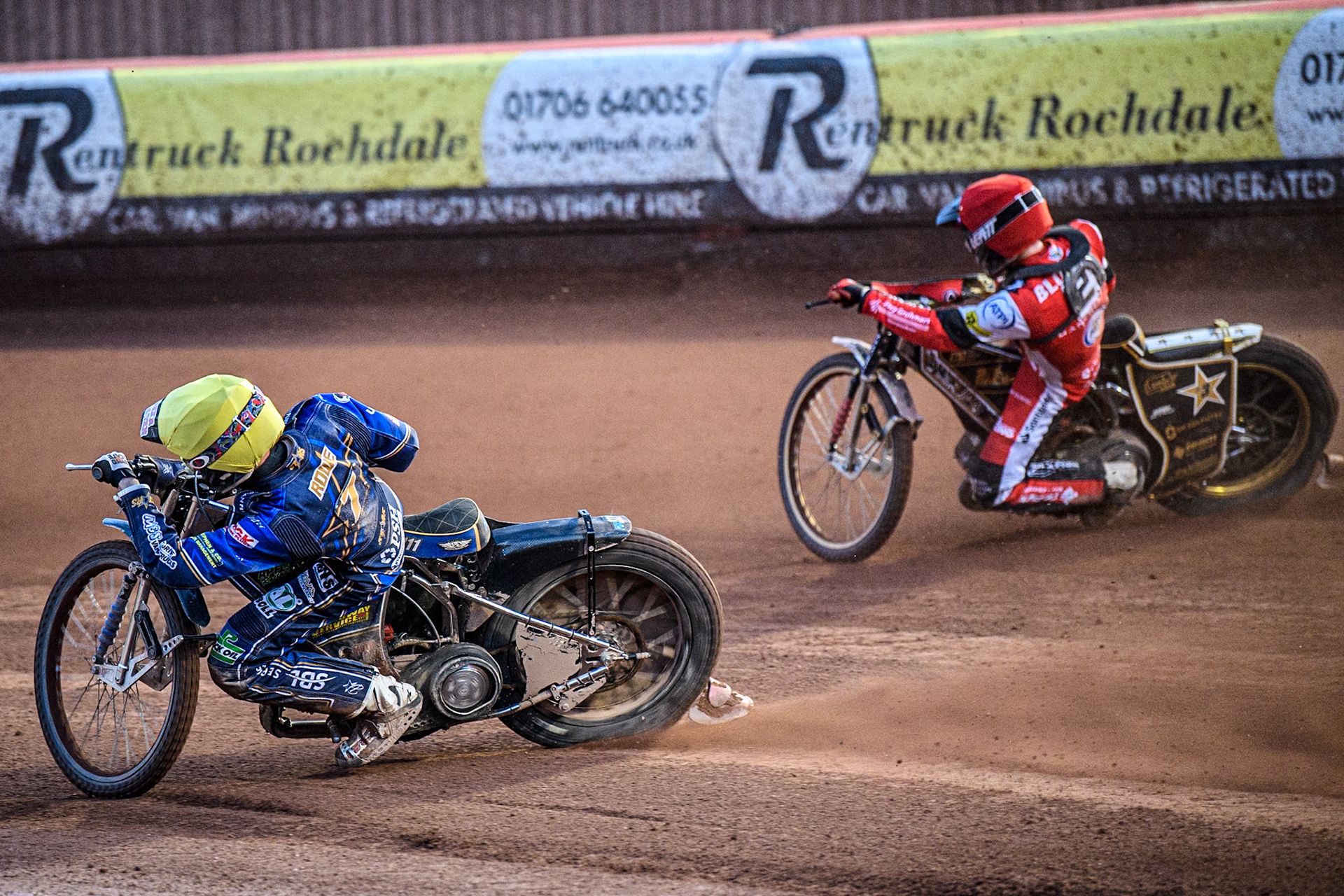 Kings Lynn Stars' Anders Rowe rides inside Belle Vue Aces' Norick Blodorn  in Red during the Rowe Motor Oil Premiership match between Belle Vue Aces and King's Lynn Stars at the National Speedway Stadium, Manchester on Monday 12th August 2024. (Photo: Ian Charles | MI News)