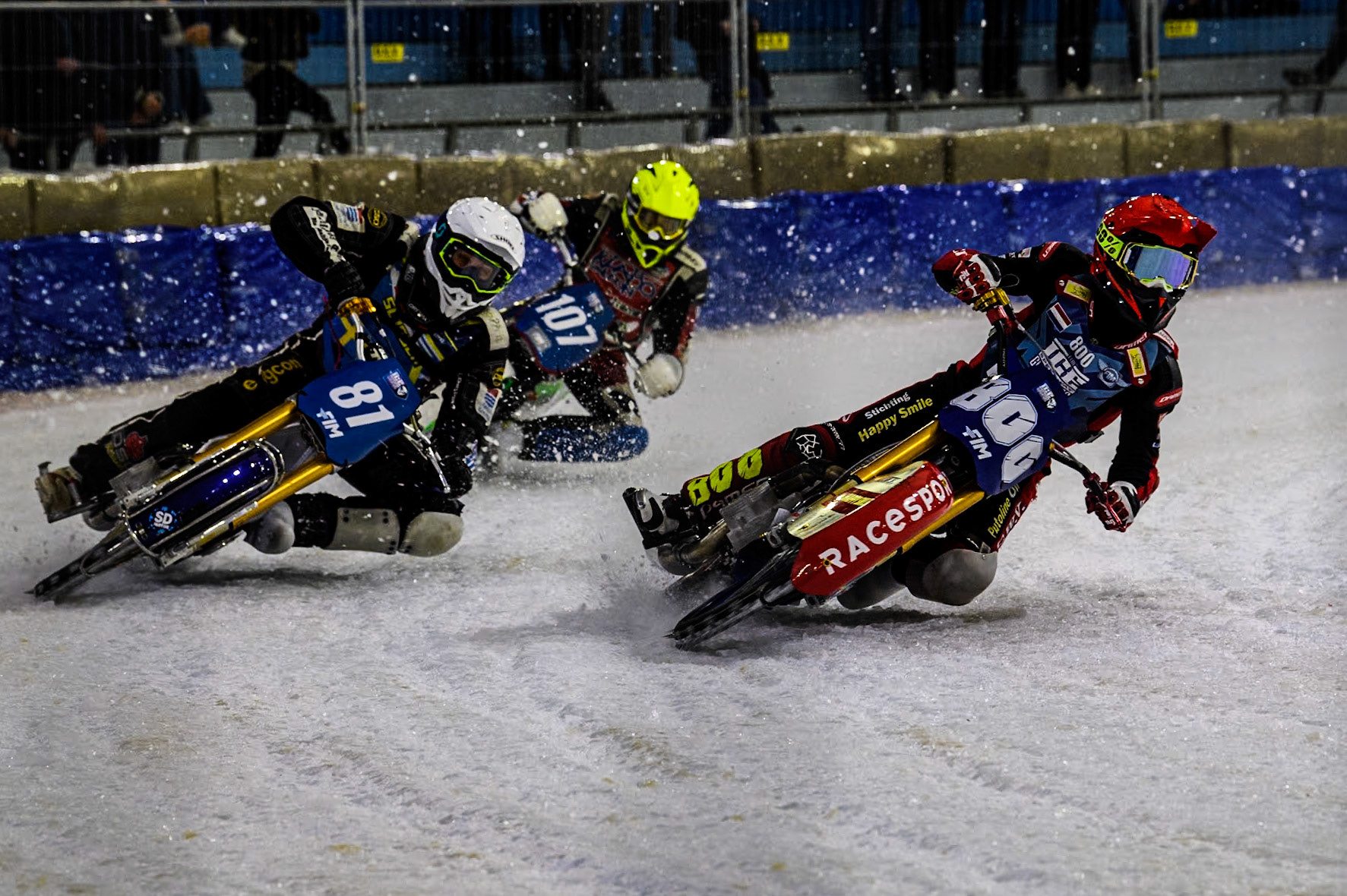 Netherlands' Jasper Iwema (800) in Red rides inside Sweden"s Jimmy Olsén (81) in White with Czech Republic's Andrej Diviš (107) in Yellow behind during the FIM Ice Speedway Gladiators World Championship Final 4 at Ice Rink Thialf, Heerenveen on Sunday 7th April 2024. (Photo: Ian Charles | MI News)