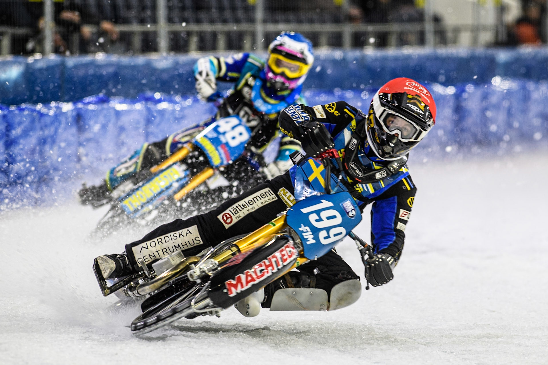 Martin Haarahiltunen (199) of Sweden in Red leading Luca Bauer (48) of Germany in Blue during the FIM Ice Speedway Gladiators World Championship, Final 3 at the Ice Stadium, Thialf, Heerenveen on Saturday 5th April 2025. (Photo: Ian Charles | MI News)