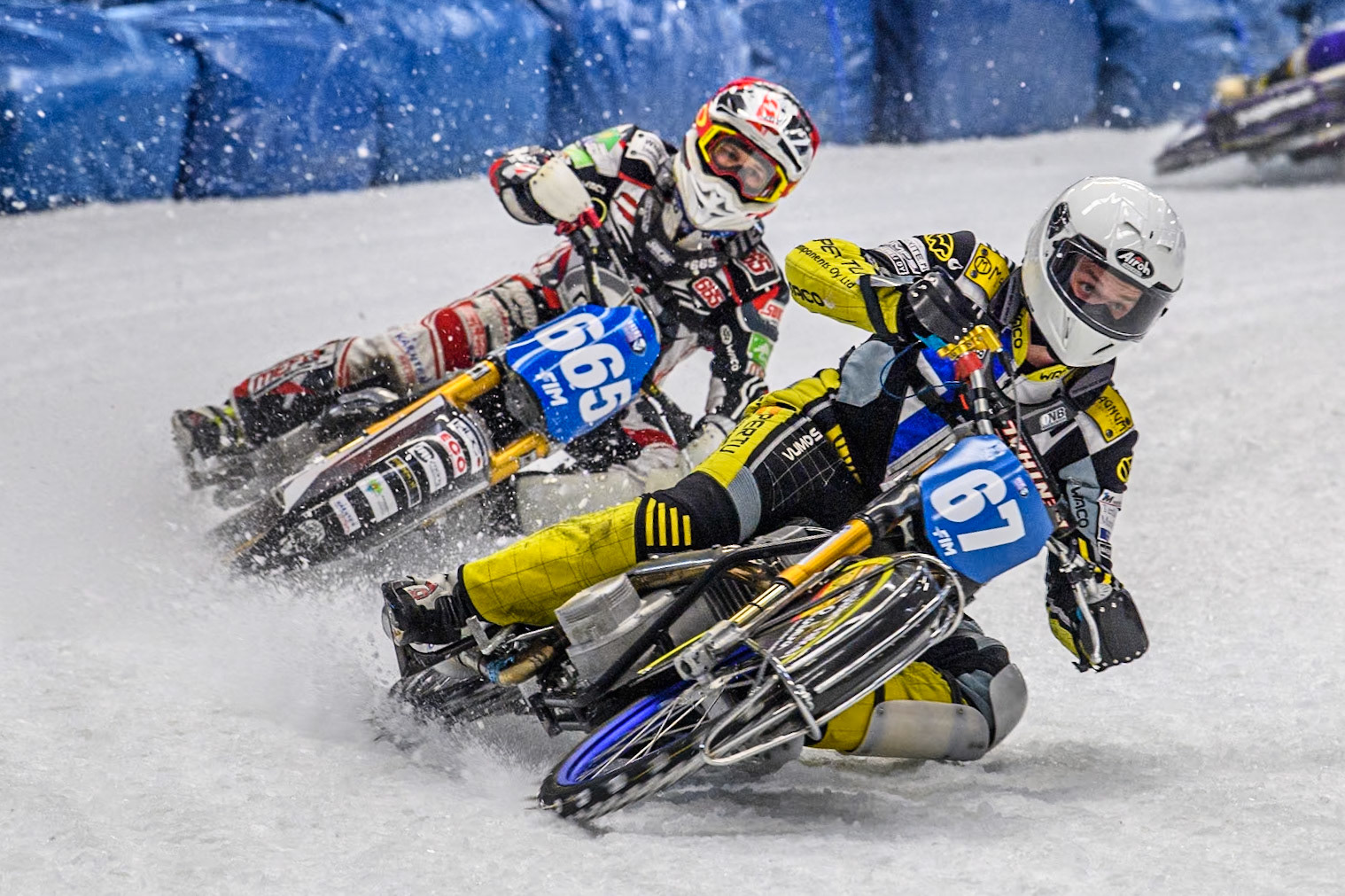 Finland's Heikki Huusko (67) (White) leads  Sweden's Jimmy Hörnell Lidfalk (237) (Red) during the FIM Ice Speedway Gladiators World Championship Final 2 at the Max-Aicher-Arena, Inzell on Sunday 24 March 2024. (Photo: Ian Charles | MI News)