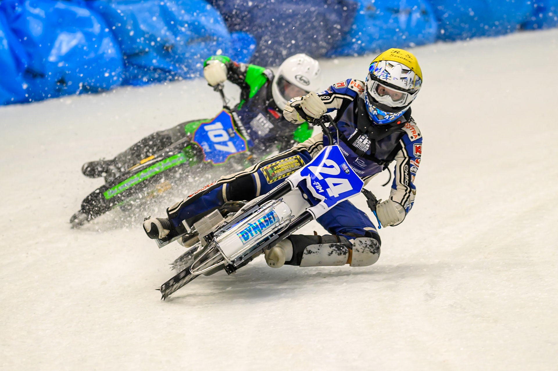 Max Koivula (24) of Finland  in Yellow leading Andrej Divis (107) of Czechia in White during the Ice Speedway Gladiators World Championship Final 2 at Max-Aicher-Arena, Inzell on Sunday 15th March 2026. (Photo: Ian Charles | MI News)