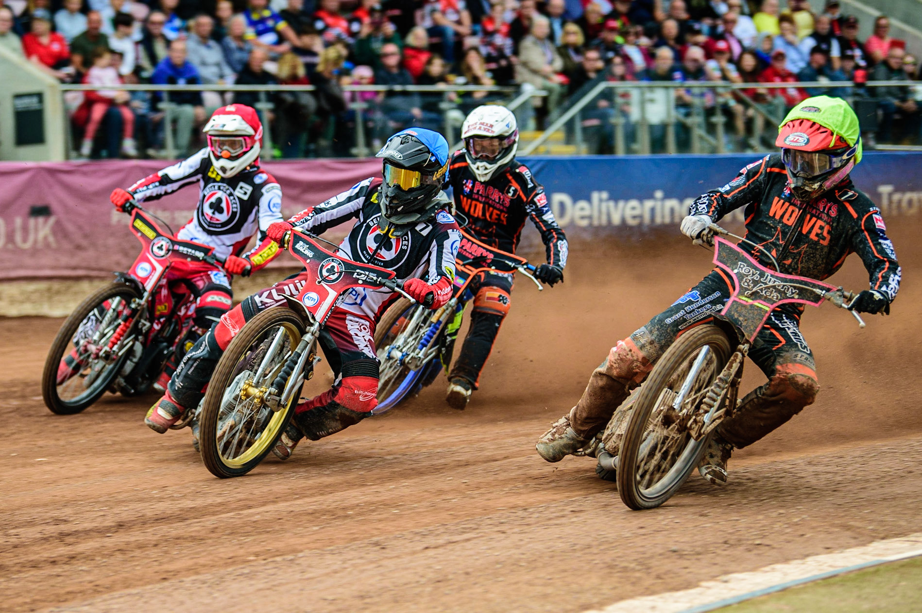 Norick Blödorn  (Blue) outside Leon Flint  (Yellow) with Max Fricke  (Red) and Nick Morris (White) behind during the SGB Premiership match between Belle Vue Aces and Wolverhampton Wolves at the National Speedway Stadium, Manchester on Monday 29th August 2022. (Credit: Ian Charles | MI News)
