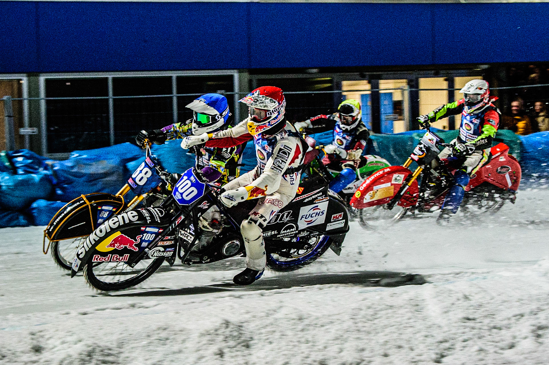 Franz Zorn (Red) inside Max Neidermaier (Blue) with Harald Simon (White) and Andrej Divis (Yellow) behind during the German Individual Ice Speedway Championship at Horst-Dohm-Eisstadion, Berlin on Friday 3rd March 2023. (Photo: Ian Charles | MI News)