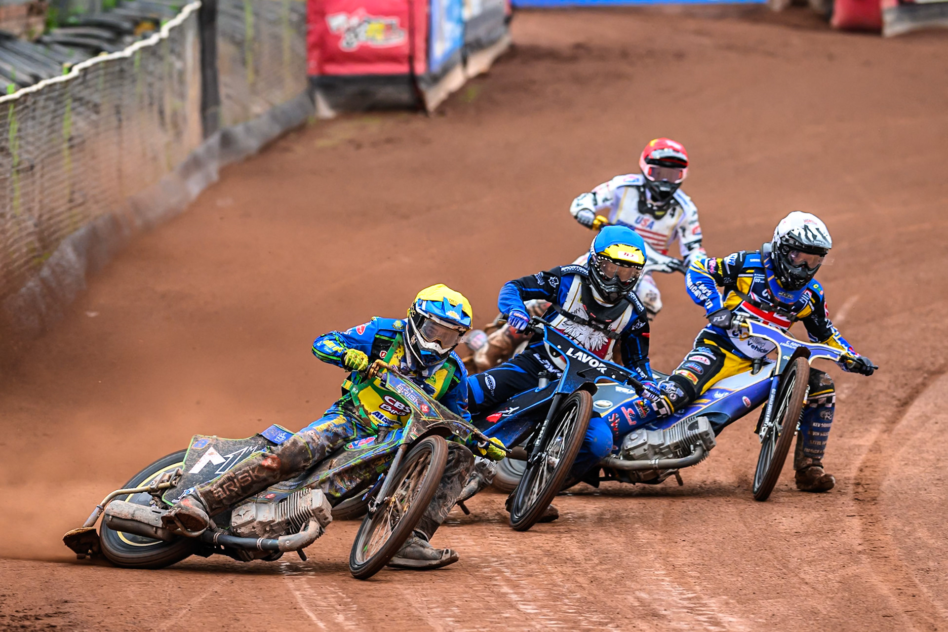 Michael West of Australia in Yellow leading Antoni Mencel of Poland in Blue, Joe Thompson of Great Britain in White and Slater Lightcap of The United States in Red during the FIM SGP2 Qualifying Round at the Peugeot Ashfield Stadium in Glasgow on Saturday 24th May 2025. (Photo: Ian Charles | MI News)