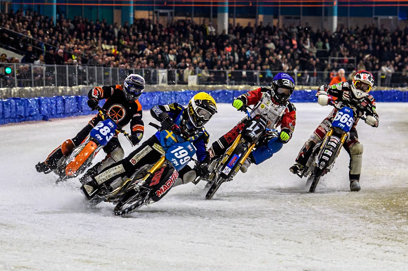 Sweden's Martin Haarahiltunen (199)  in Yellow leading Reserve  Sweden's Filip Jäger (17) in Blue, Austria's Charly Ebner (665) in Red and Netherland's Sebastian Reitsma (283) in White during the FIM Ice Speedway Gladiators World Championship Final 3 at Ice Rink Thialf, Heerenveen on Saturday 6th April 2024. (Photo: Ian Charles | MI News)