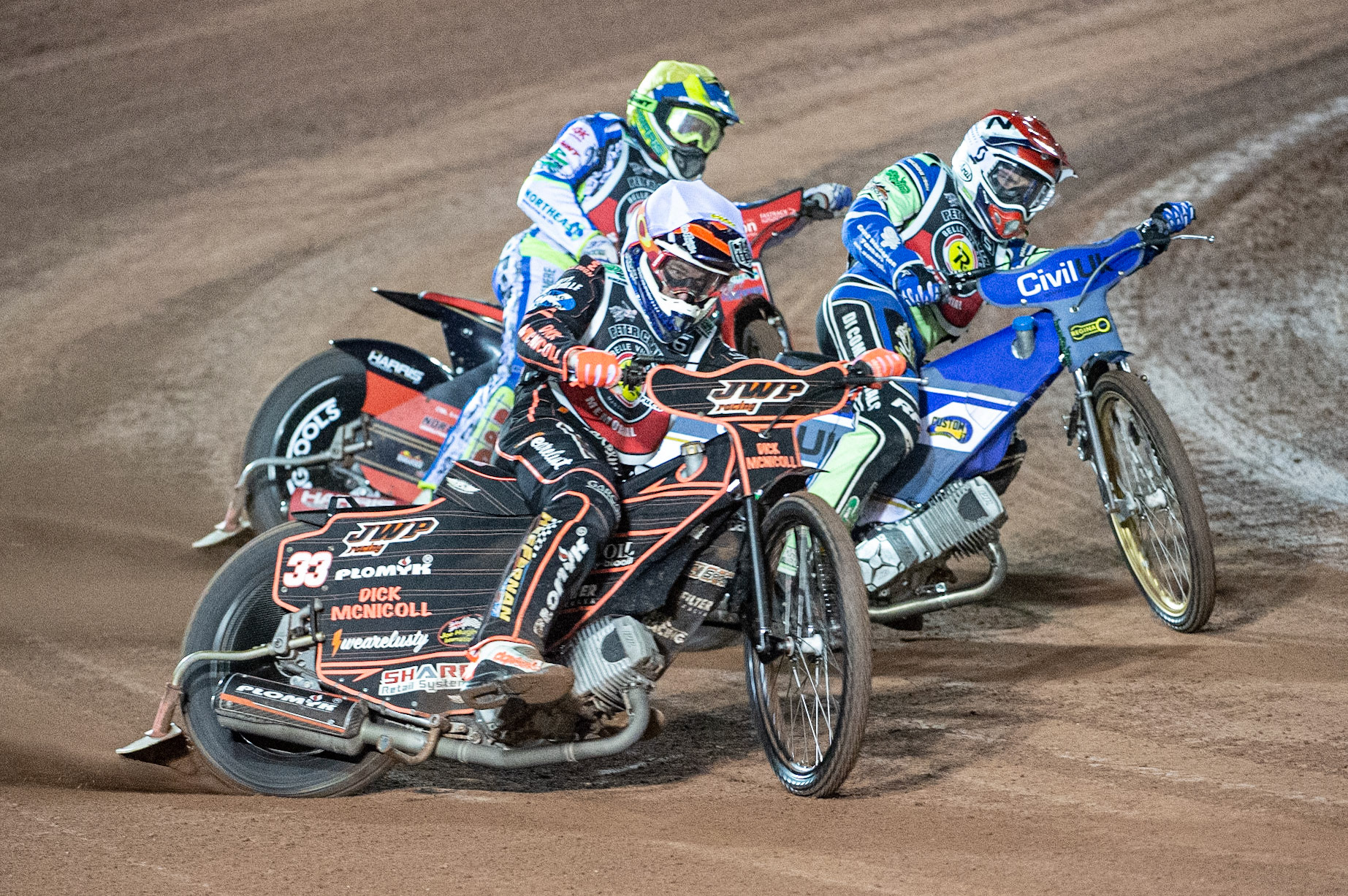 Photo: Ian CharlesSam Masters (White) outside Richie Worrall (Red) with Chris Harris (Yellow) behind Peter Craven Memorial Trophy, National Speedway Stadium, Manchester Thursday  22  October  2020